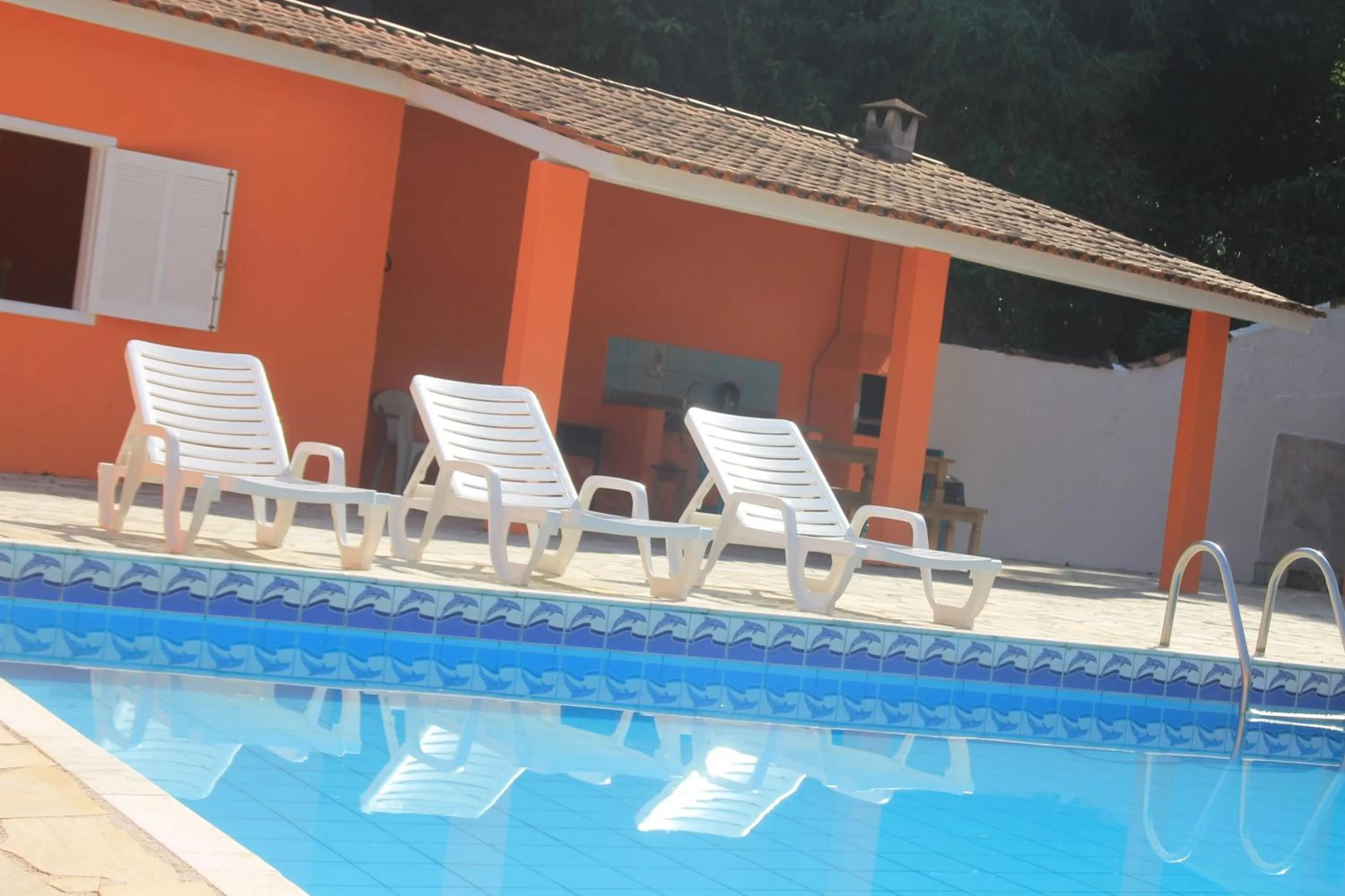 Swimming pool in Pousada Sol do Araçá