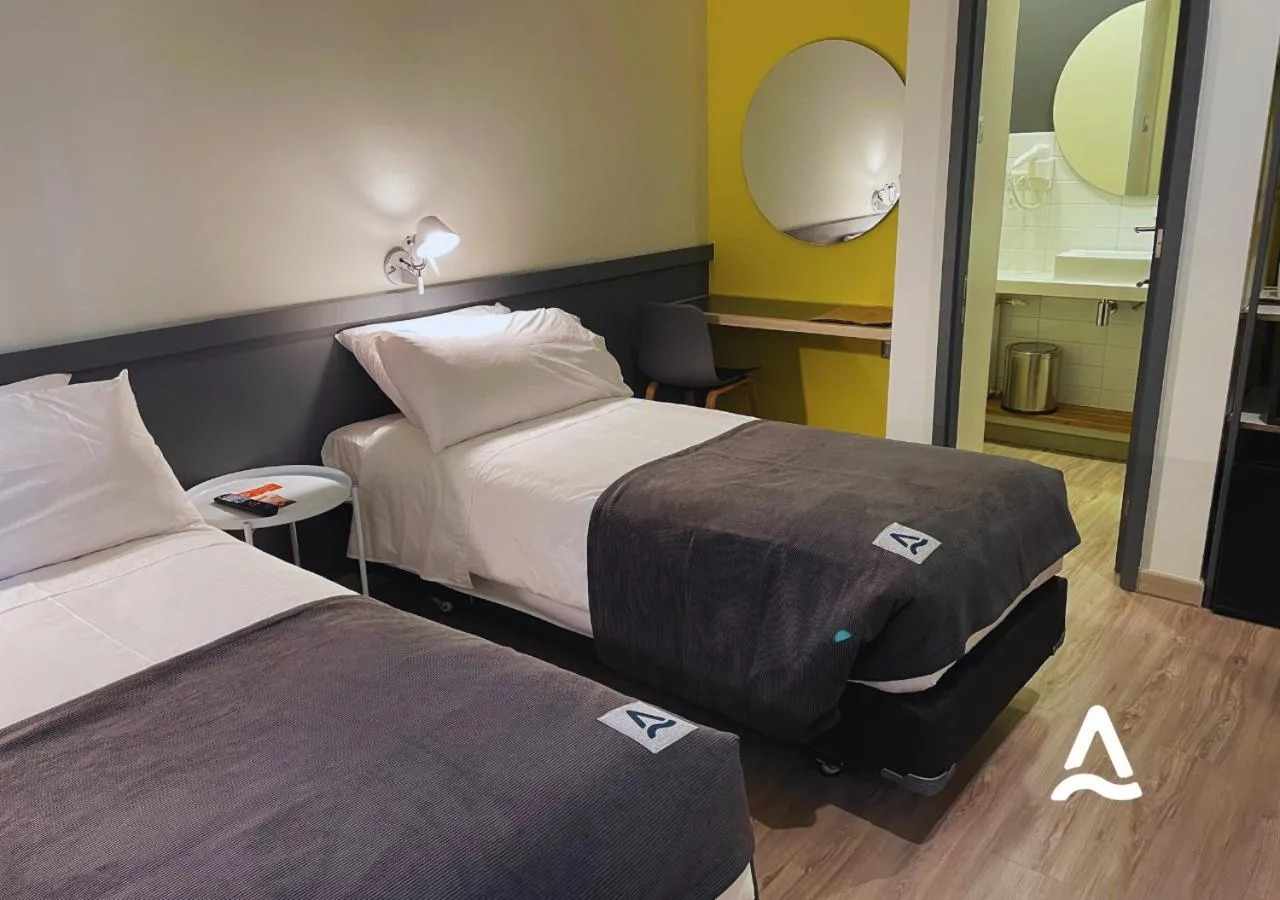 Photo of the whole room, Bed in Almasur Express Punta Arenas