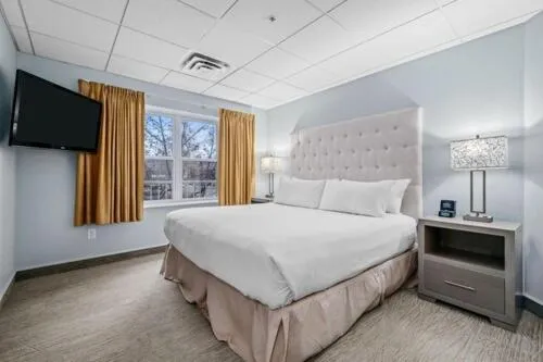 Bed in Cherry Tree Inn & Suites