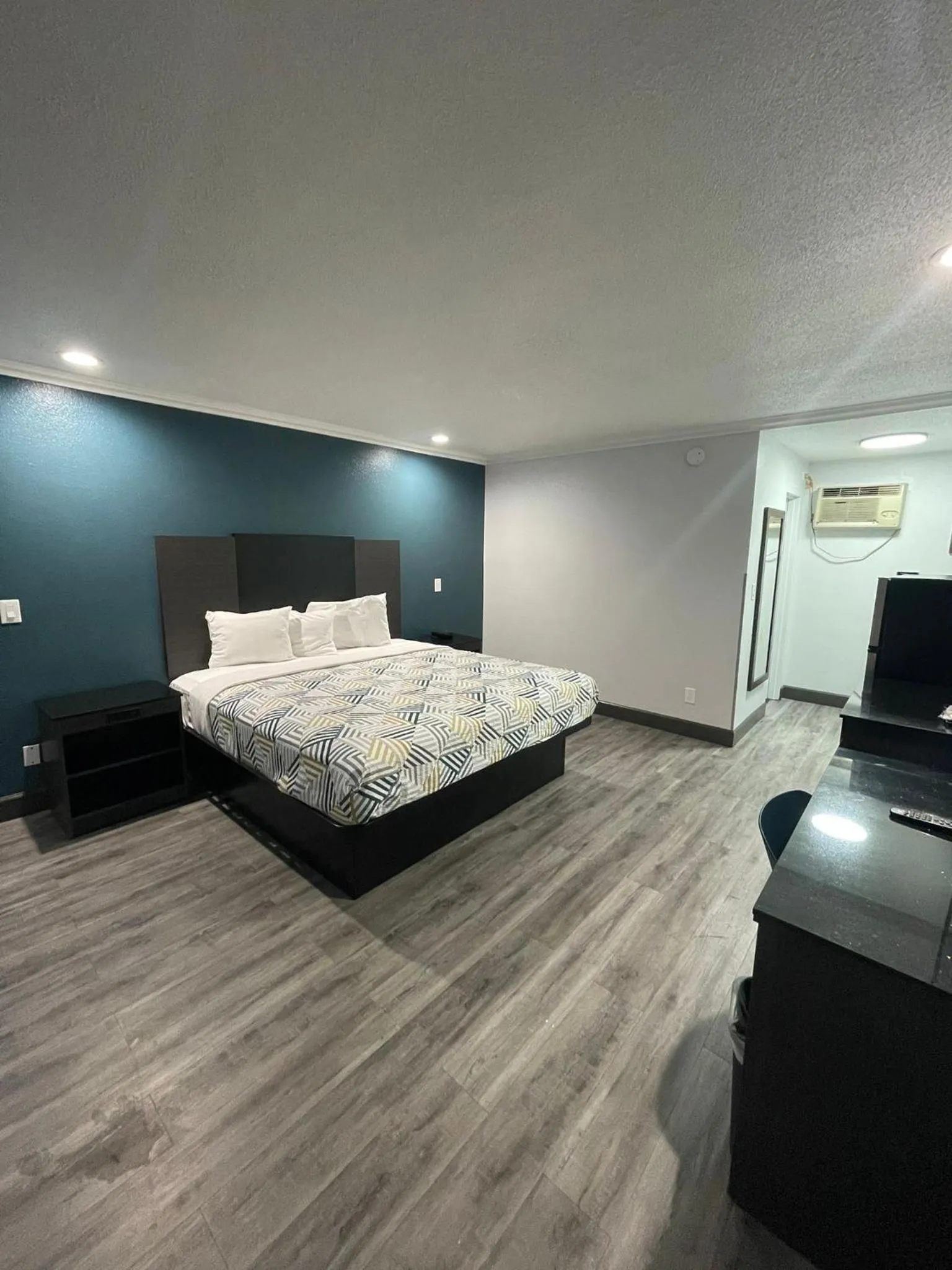 Photo of the whole room, Bed in Studio 6 Suites San Bernardino, CA