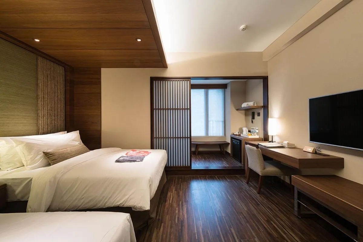 Bed in Asia Pacific Hotel Beitou