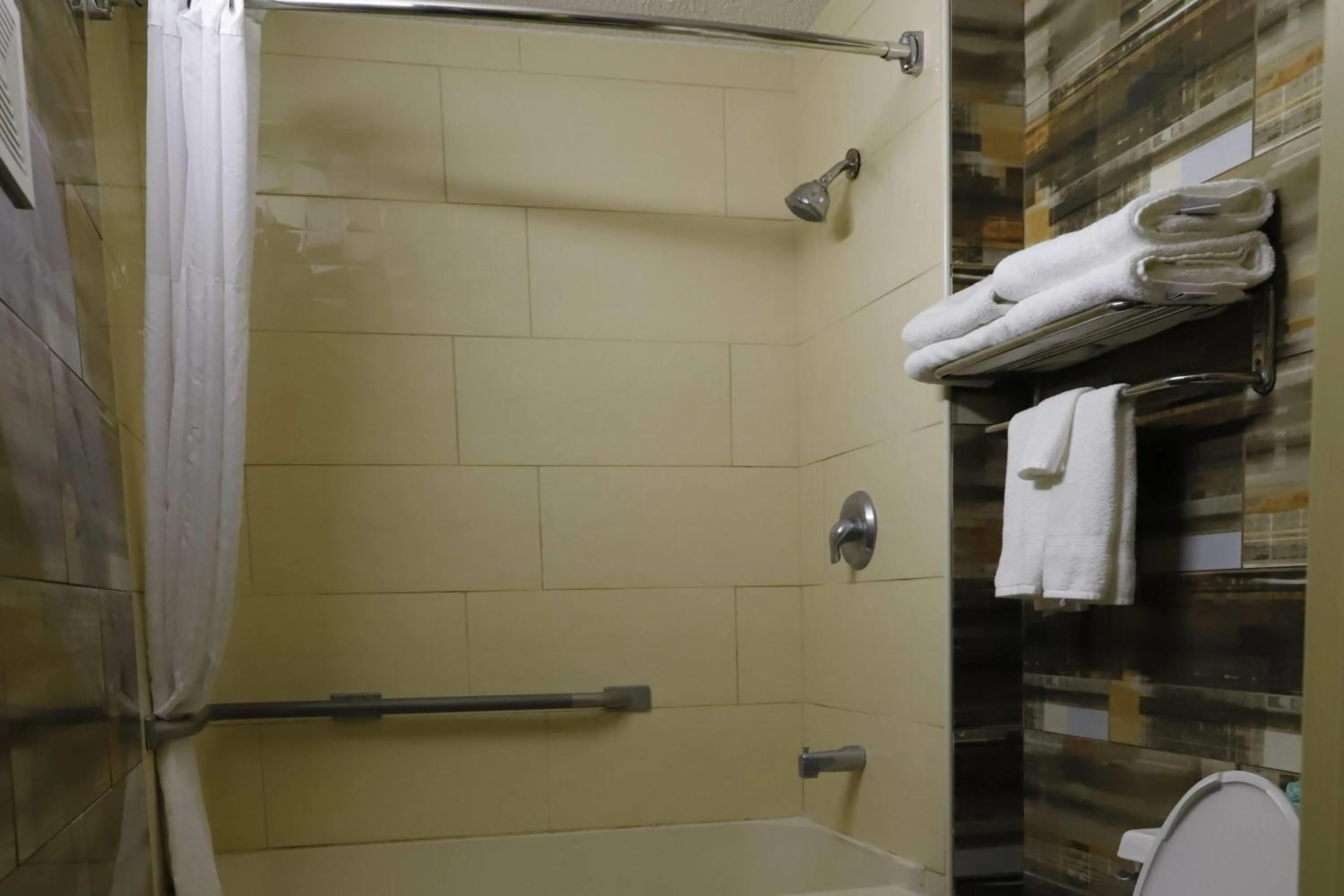 Bathroom in TraveIodge by Wyndham Parsippany