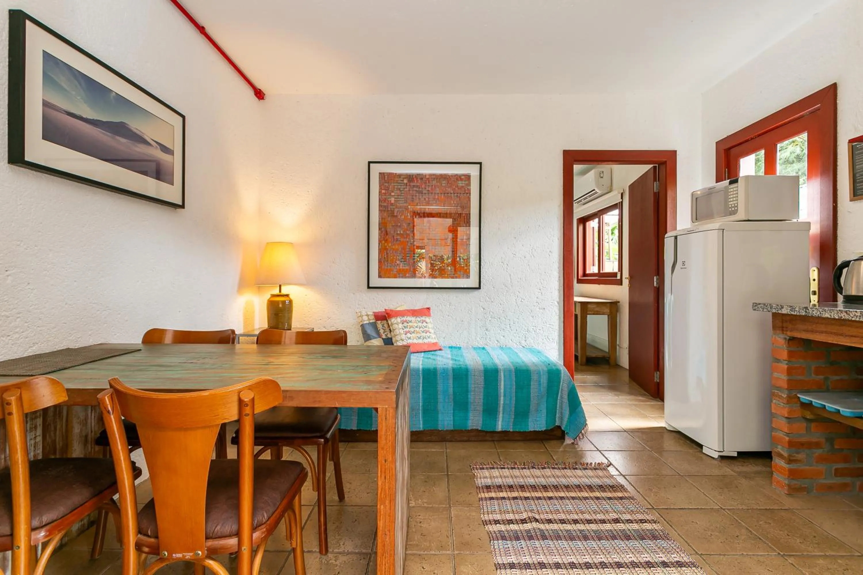 Kitchen or kitchenette, Bed in Pousada Casa da Lagoa