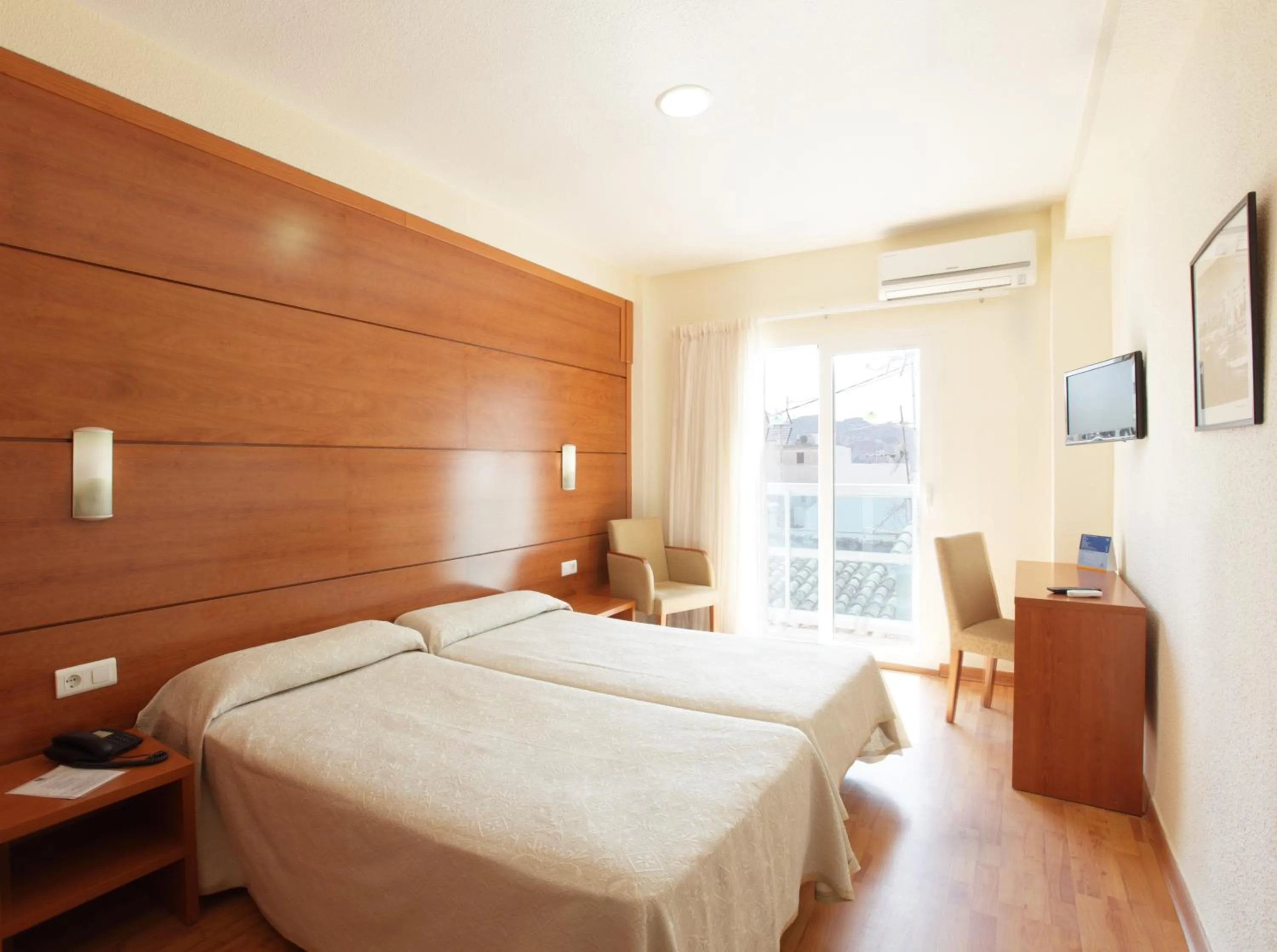 Bed in Hotel Centro Mar