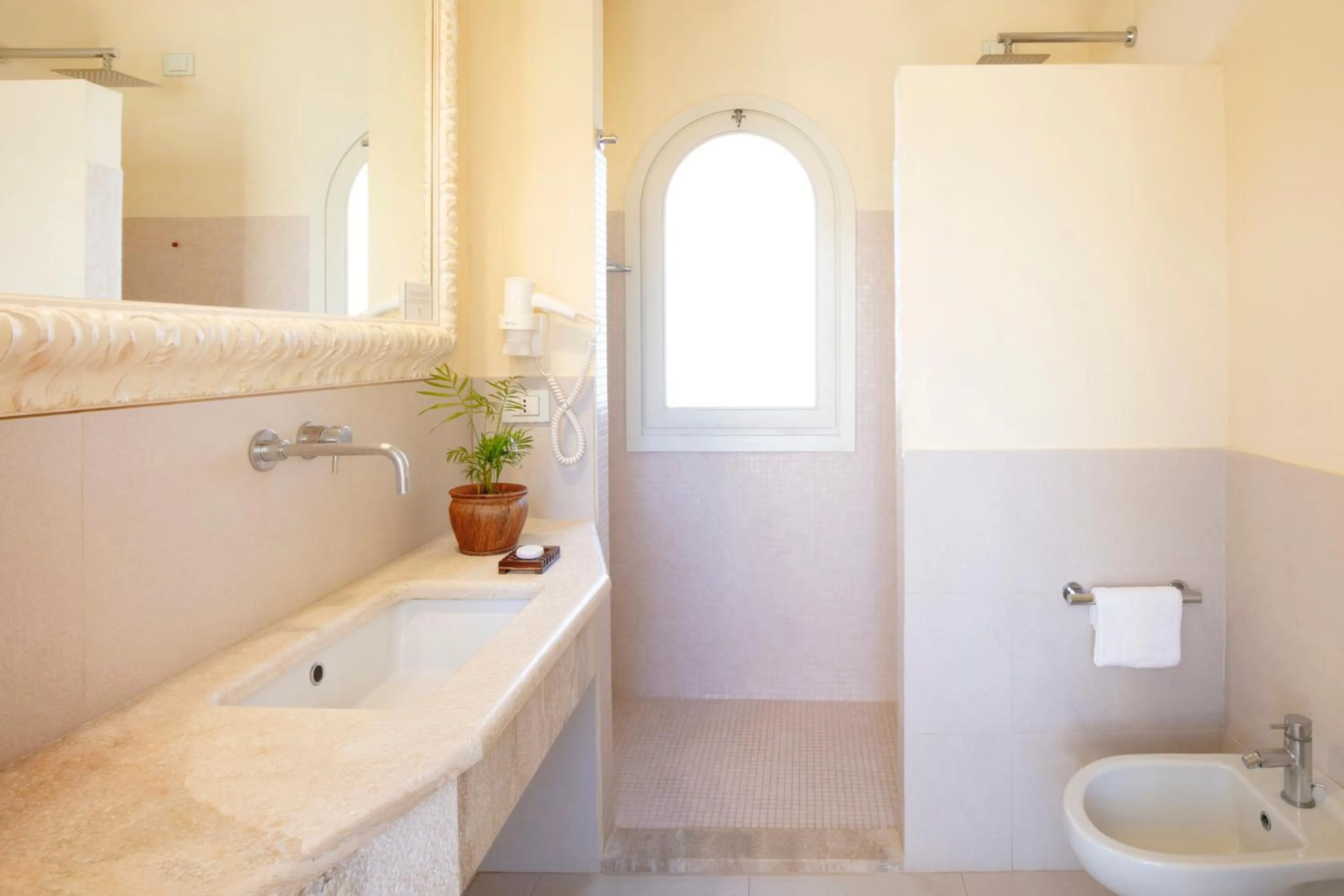 Bathroom in Spiagge San Pietro, a charming & relaxing resort
