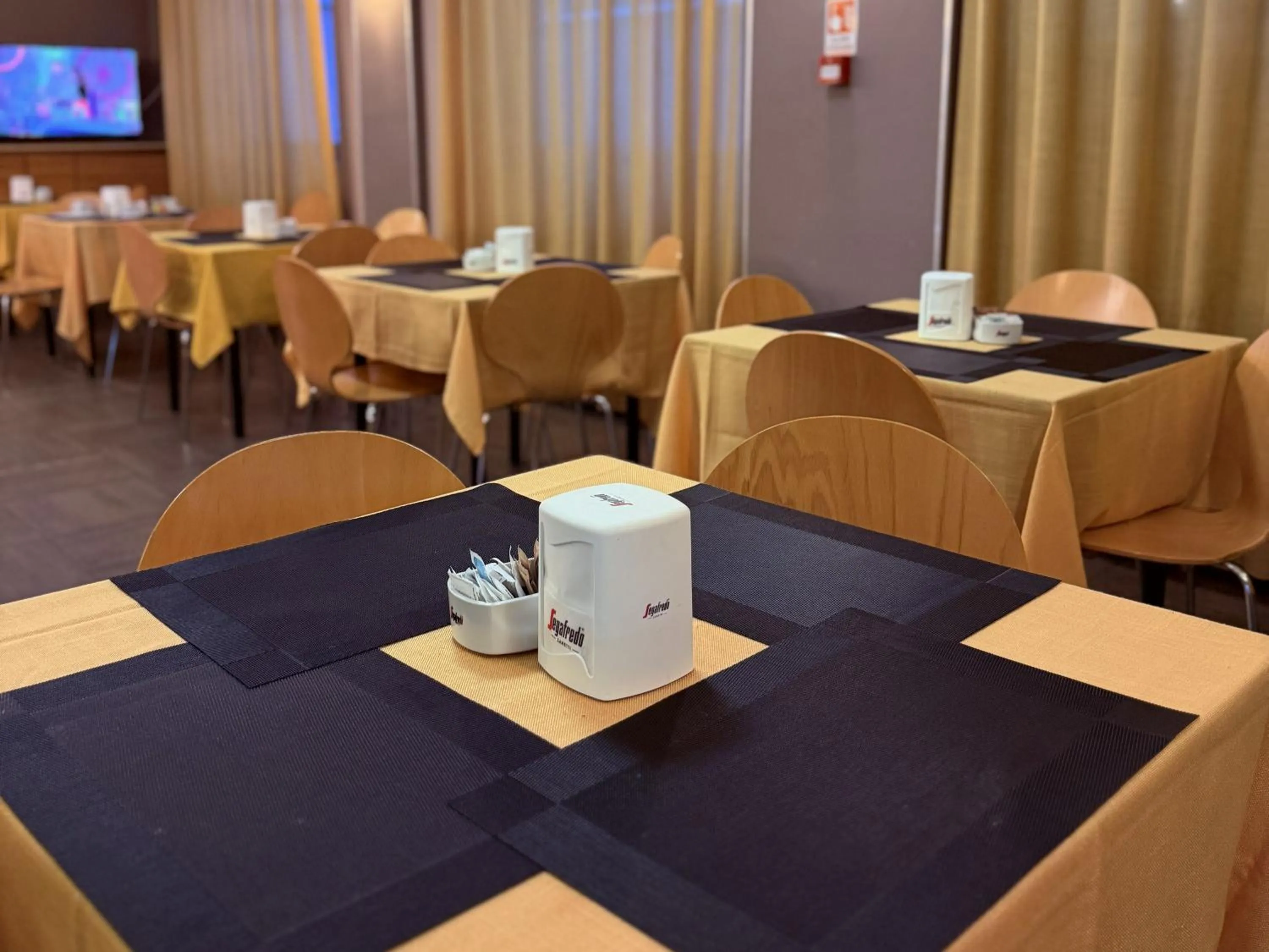 Communal lounge/ TV room in Hotel Giada