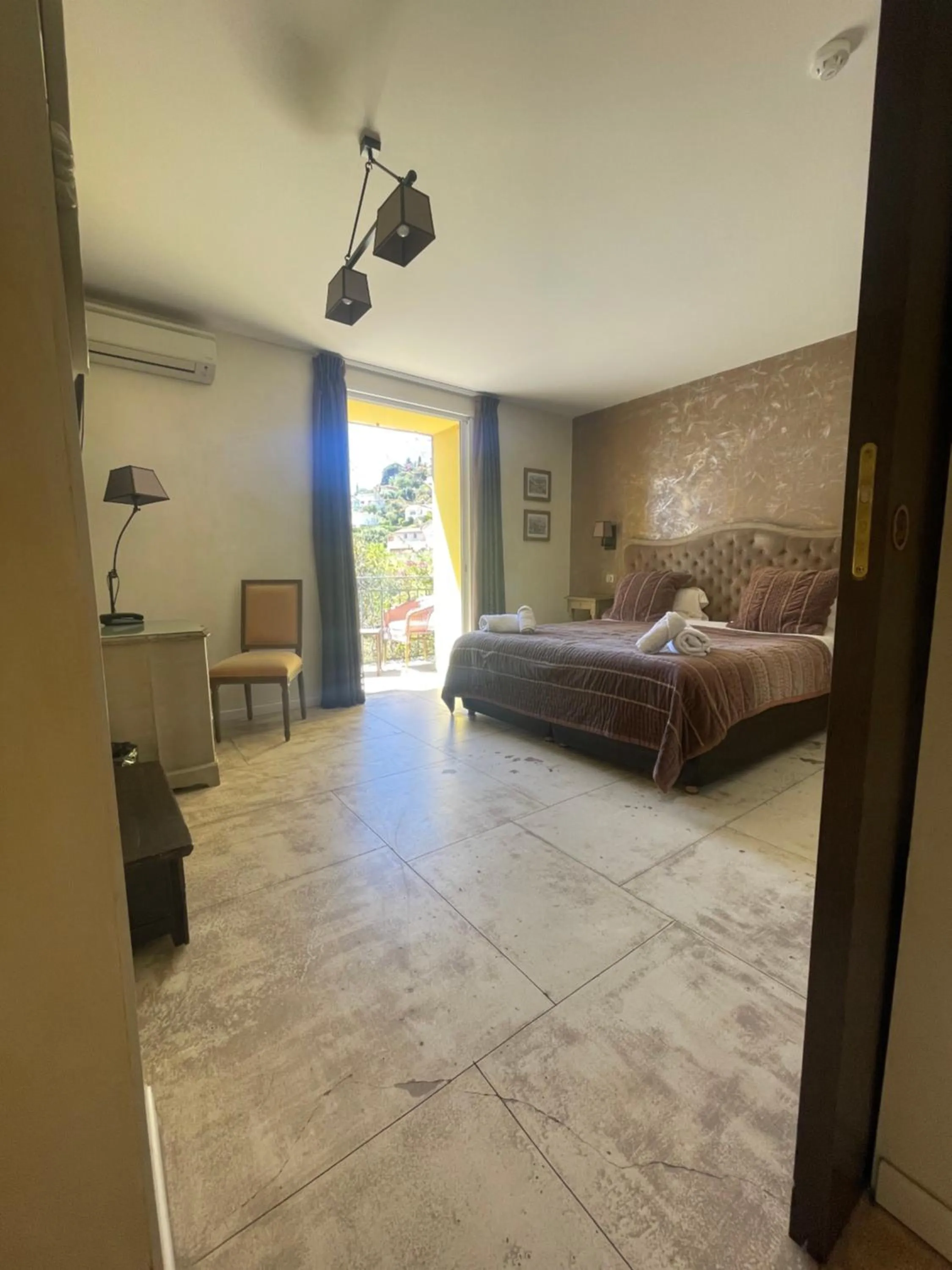 Bedroom in Hôtel de La Fossette