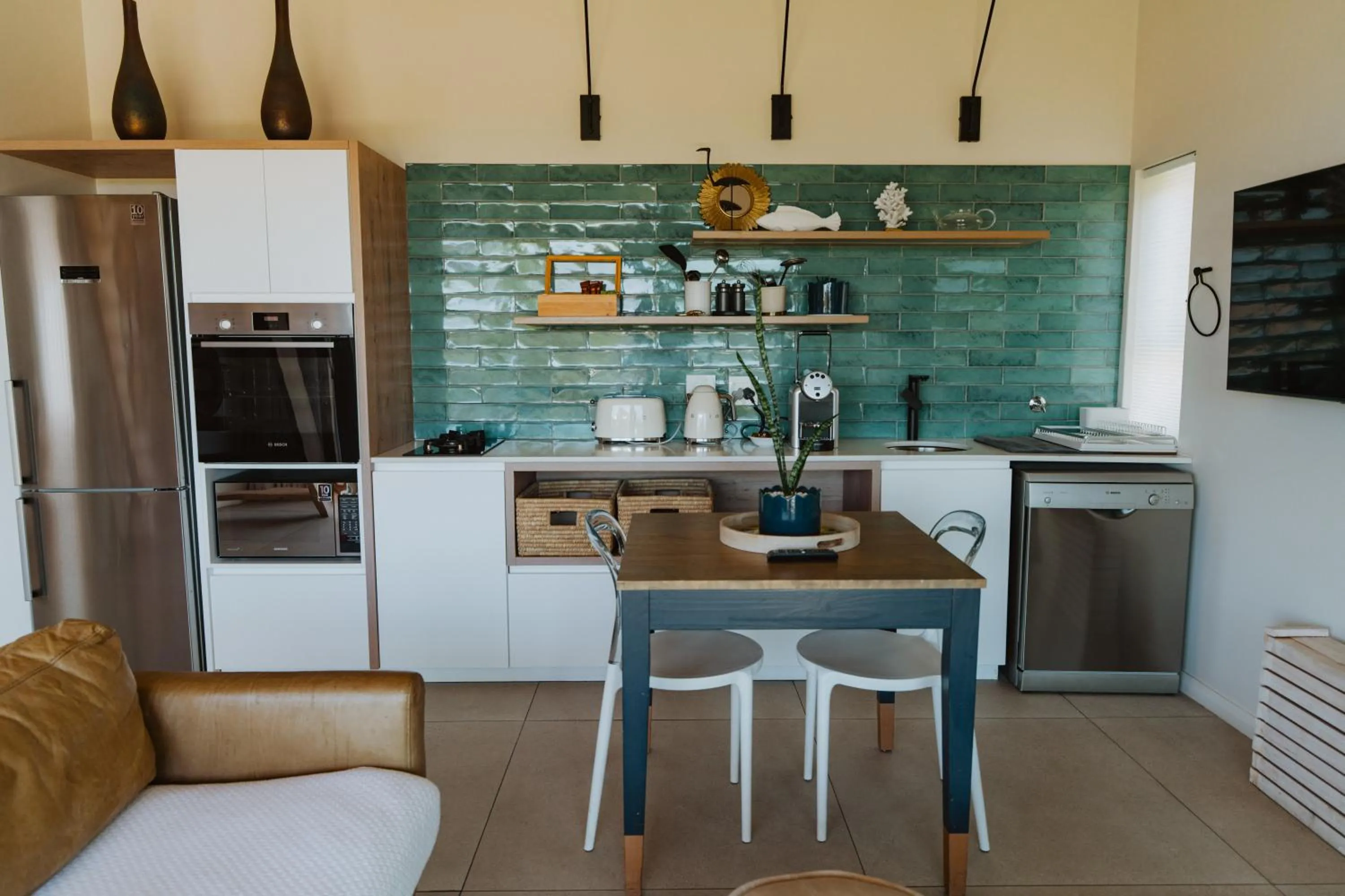 Kitchen or kitchenette in Sky Villa Boutique Hotel