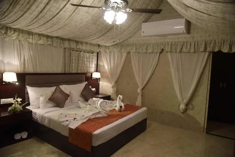 Staff, Bed in Pride Hotel & Convention Centre Indore