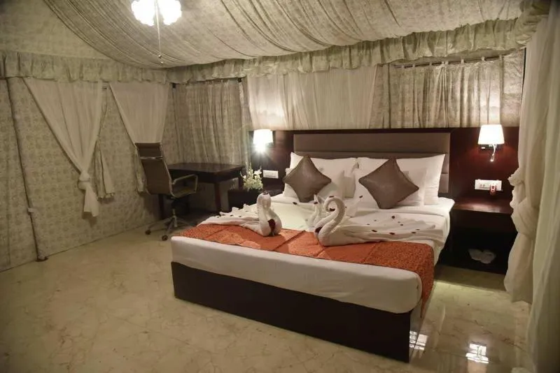 Bed in Pride Hotel & Convention Centre Indore