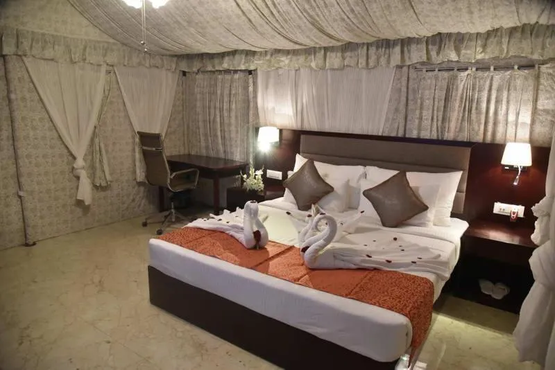 Bed in Pride Hotel & Convention Centre Indore