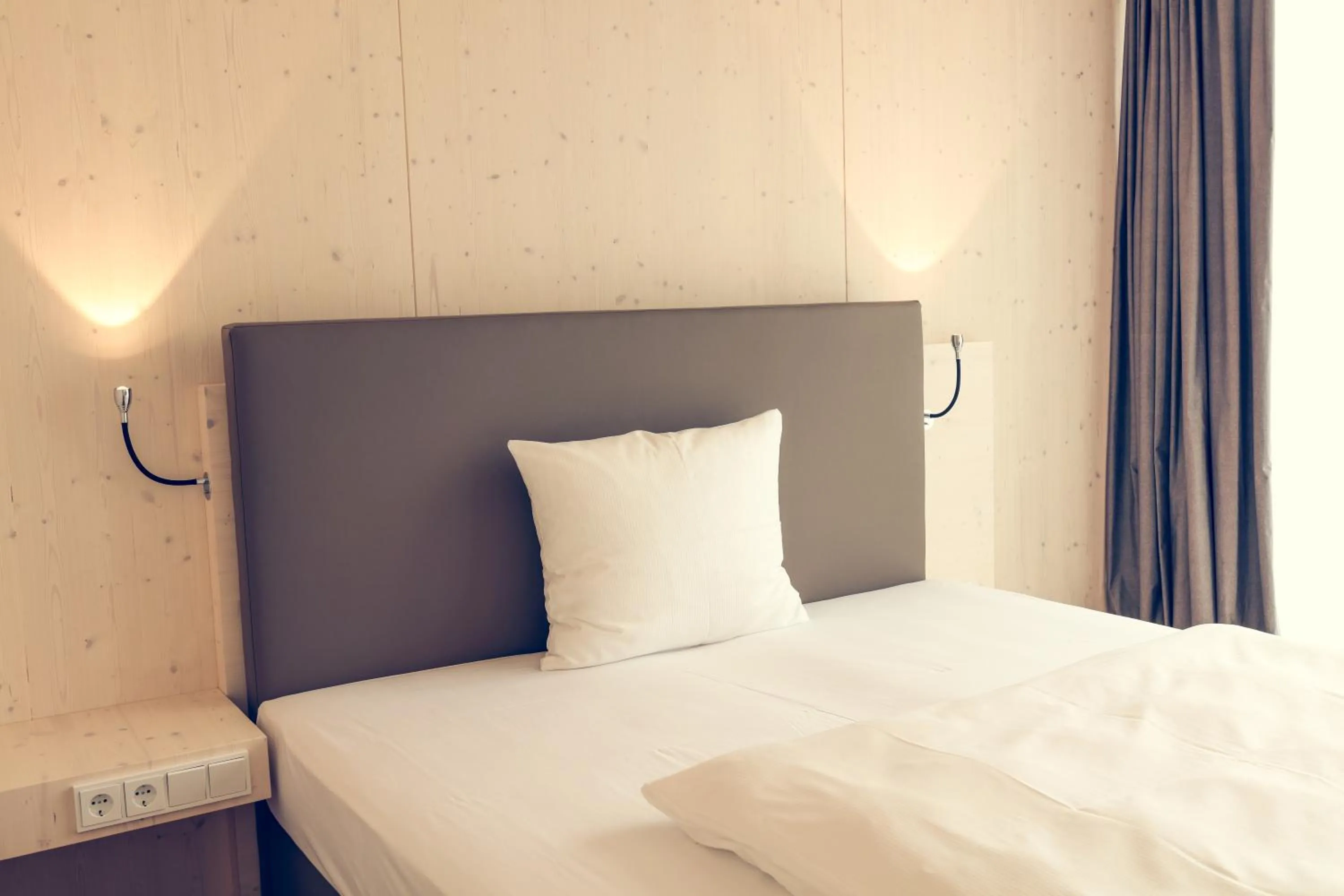 Bed in Klingenstein AKZENT Hotel Wirtshaus Brauerei