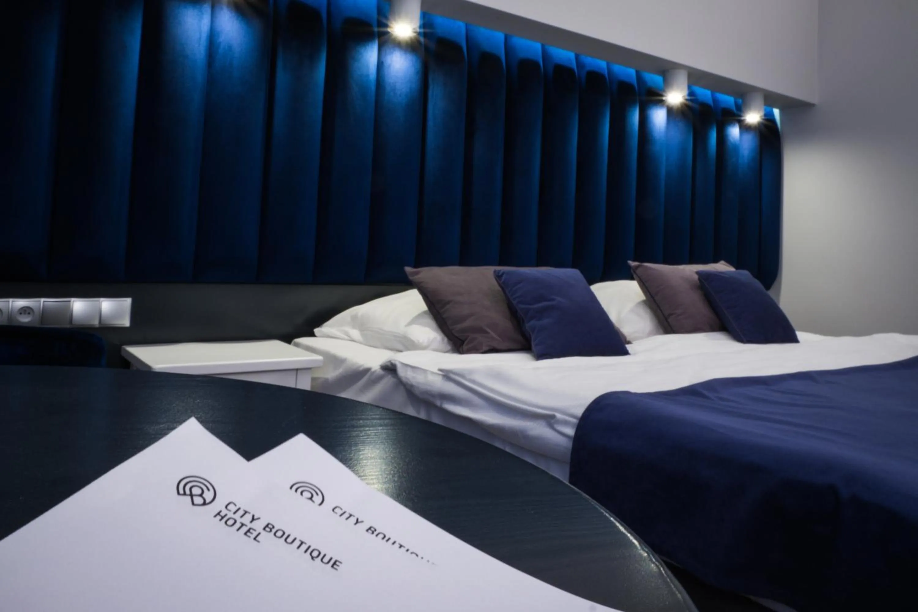 Bed in City Boutique Hotel