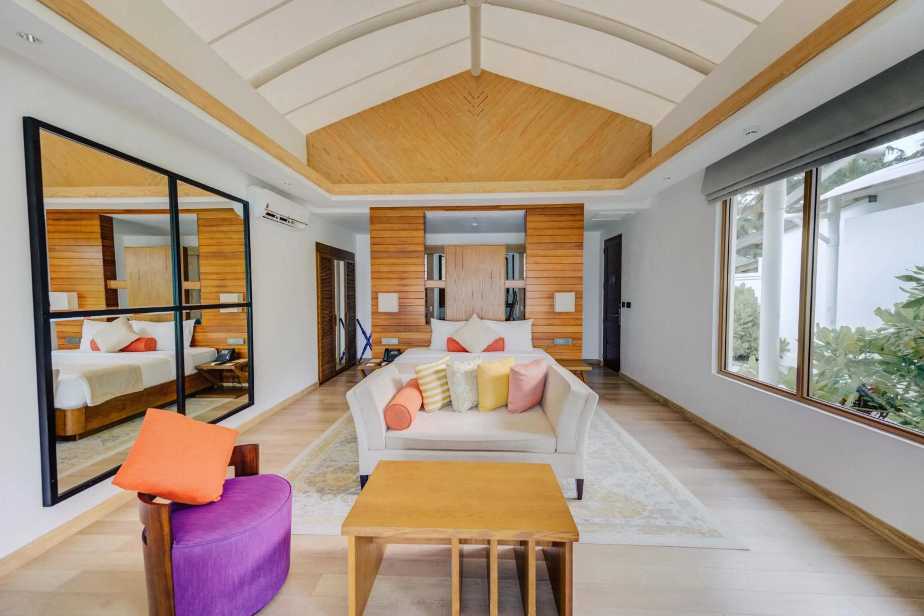 Living room, Bed in Cinnamon Hakuraa Huraa Maldives - Adults-Only
