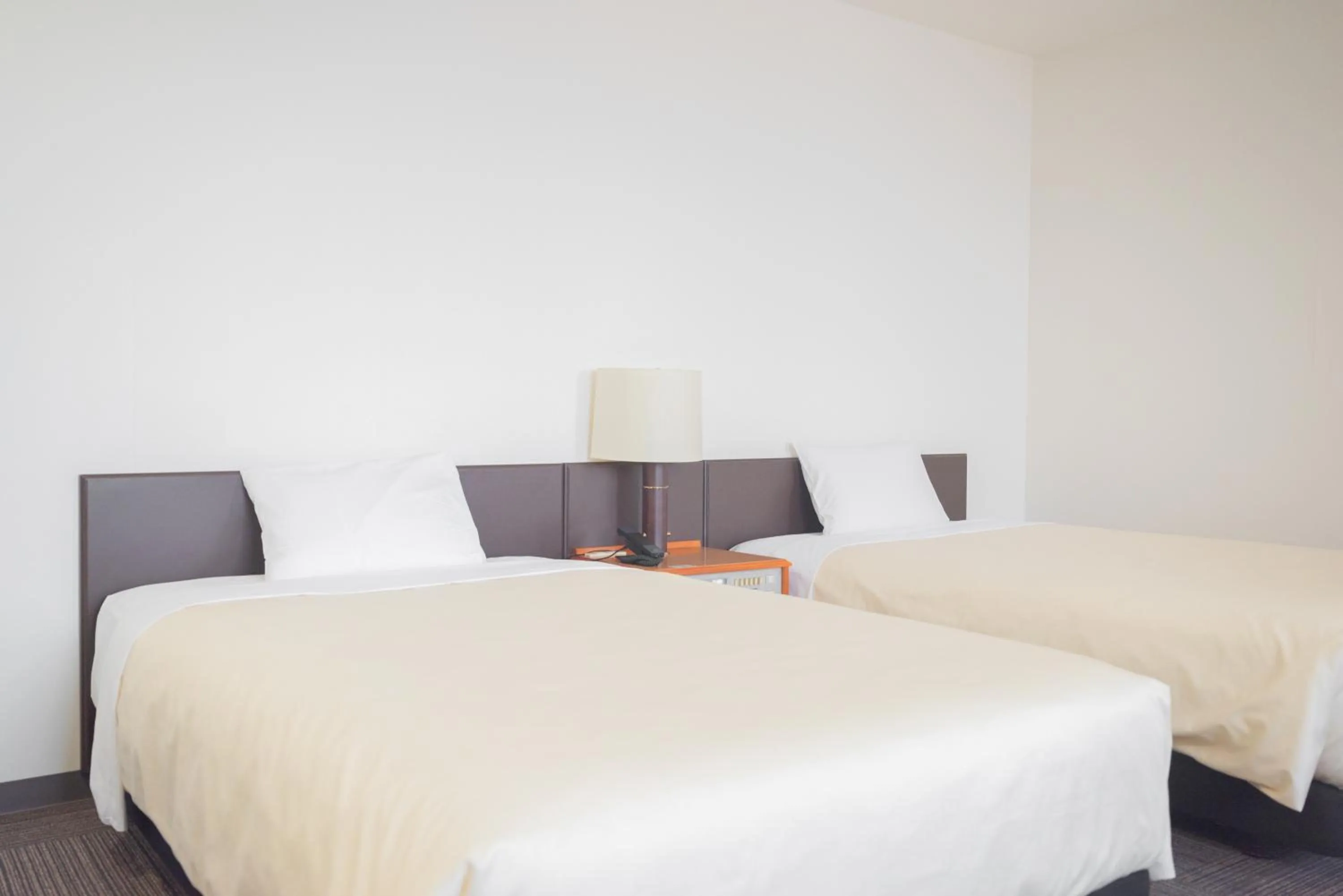 Bed in Hotel Hakodate Royal Seaside BBH Hotel Group