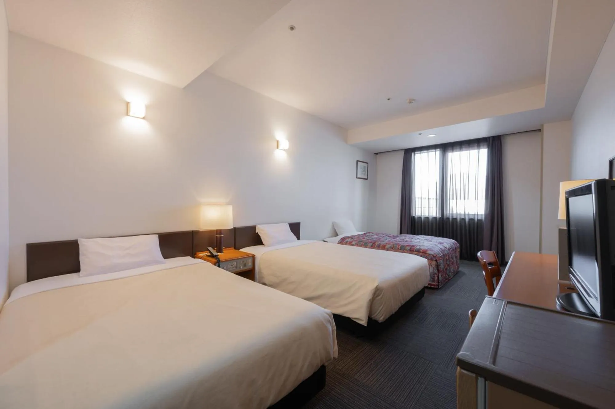 Bed in Hotel Hakodate Royal Seaside BBH Hotel Group