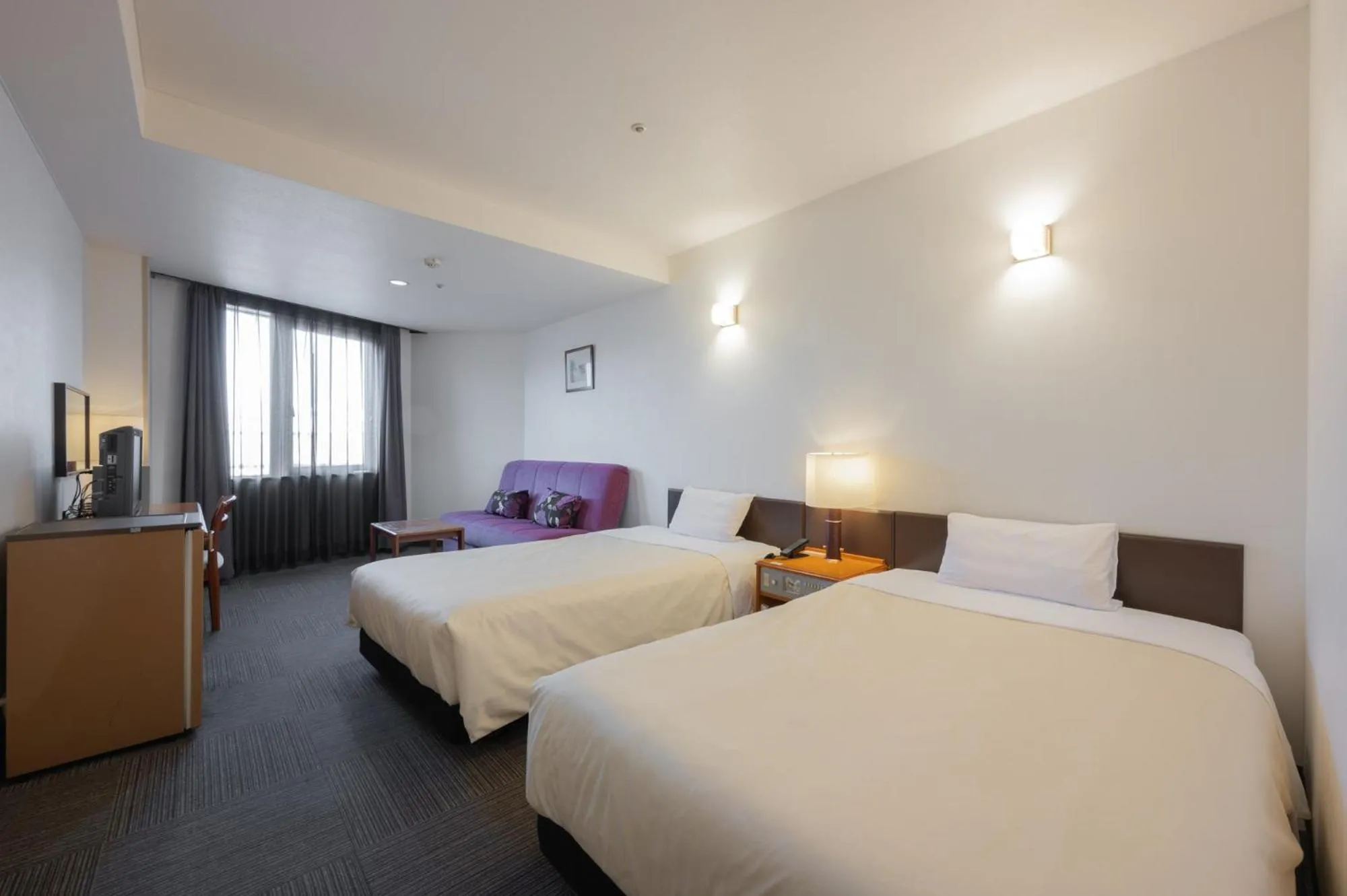 Bed in Hotel Hakodate Royal Seaside BBH Hotel Group