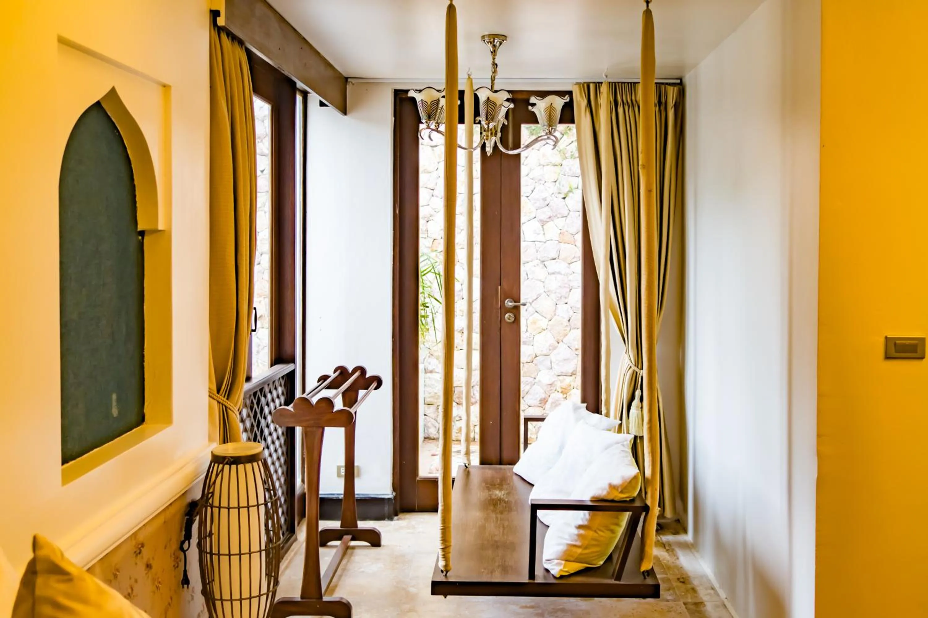 Seating area, Bed in Pawanthorn Samui - SHA Plus