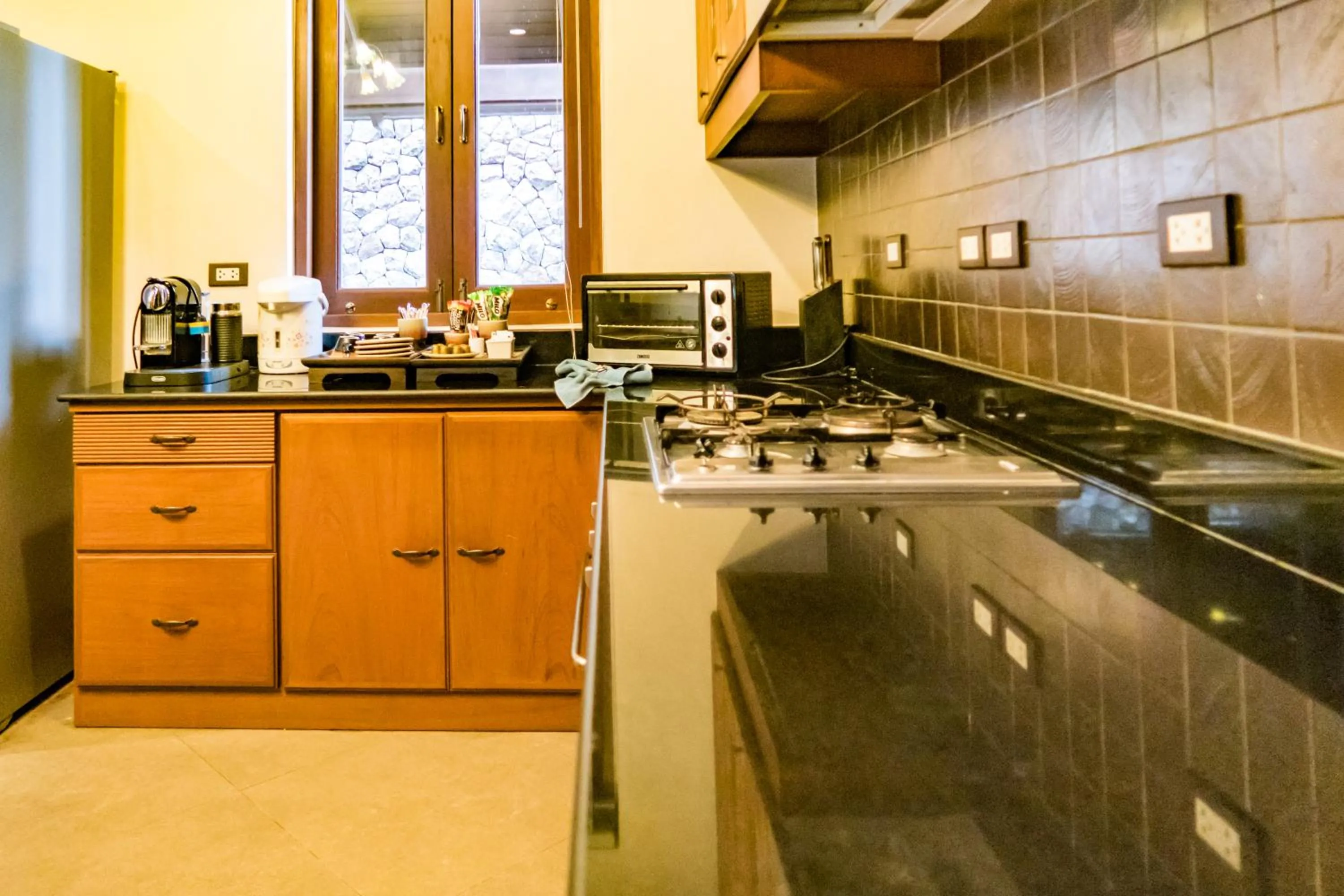 Kitchen or kitchenette in Pawanthorn Samui - SHA Plus