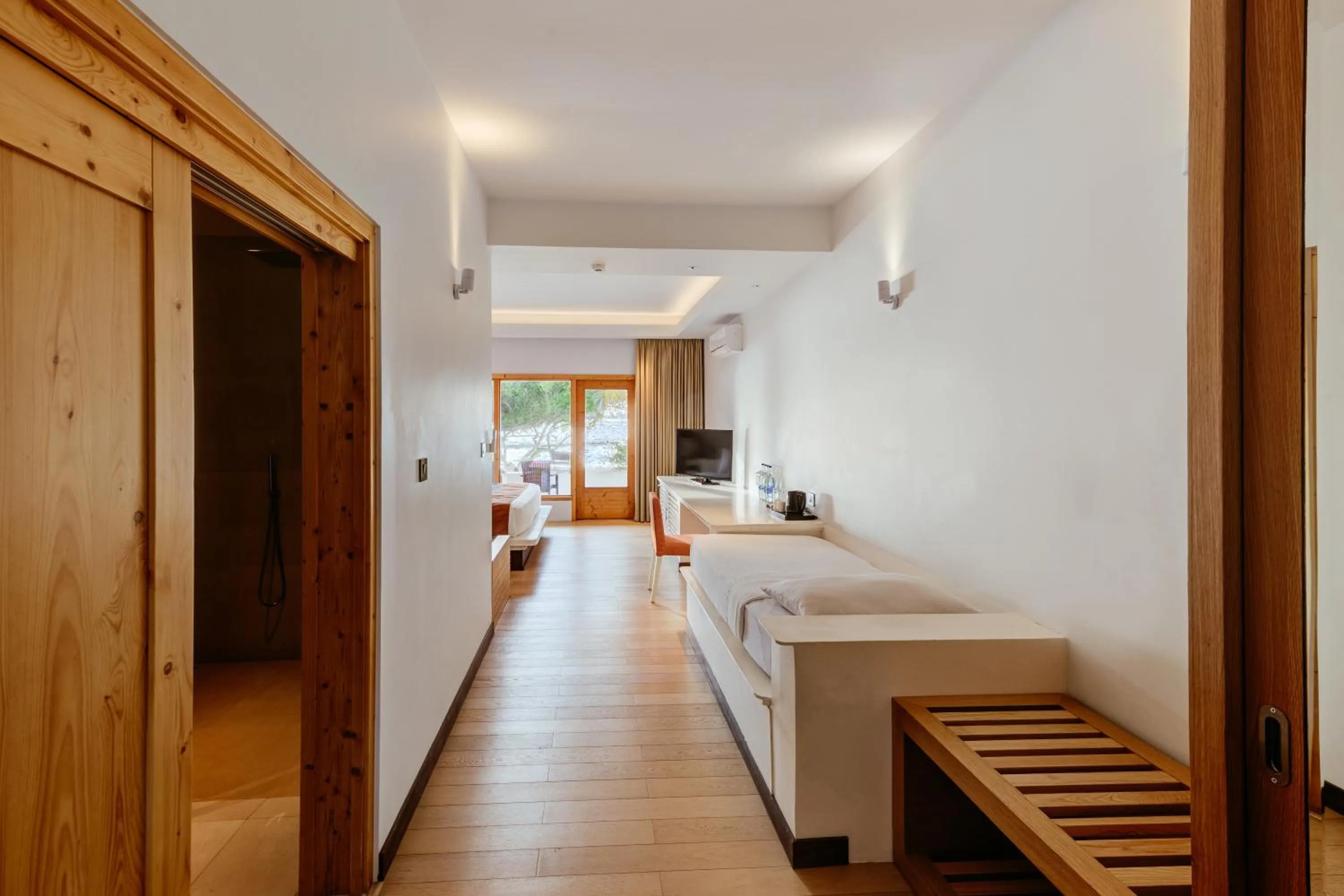 Photo of the whole room, Bed in Cinnamon Dhonveli Maldives - Free One-Way Speedboat and 02 Kids Under 12 Stay & Dine Free