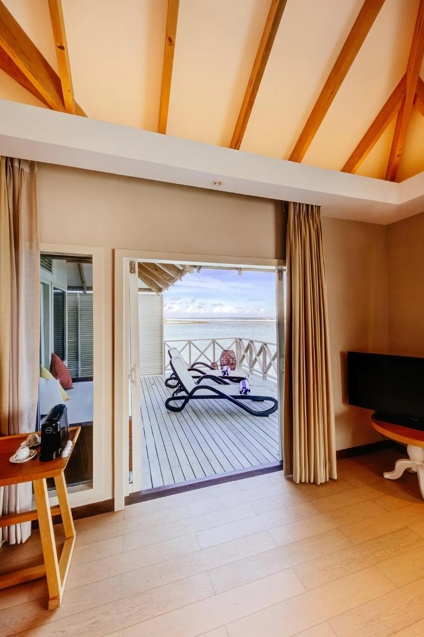 Balcony/Terrace, Bed in Cinnamon Dhonveli Maldives - Free One-Way Speedboat and 02 Kids Under 12 Stay & Dine Free