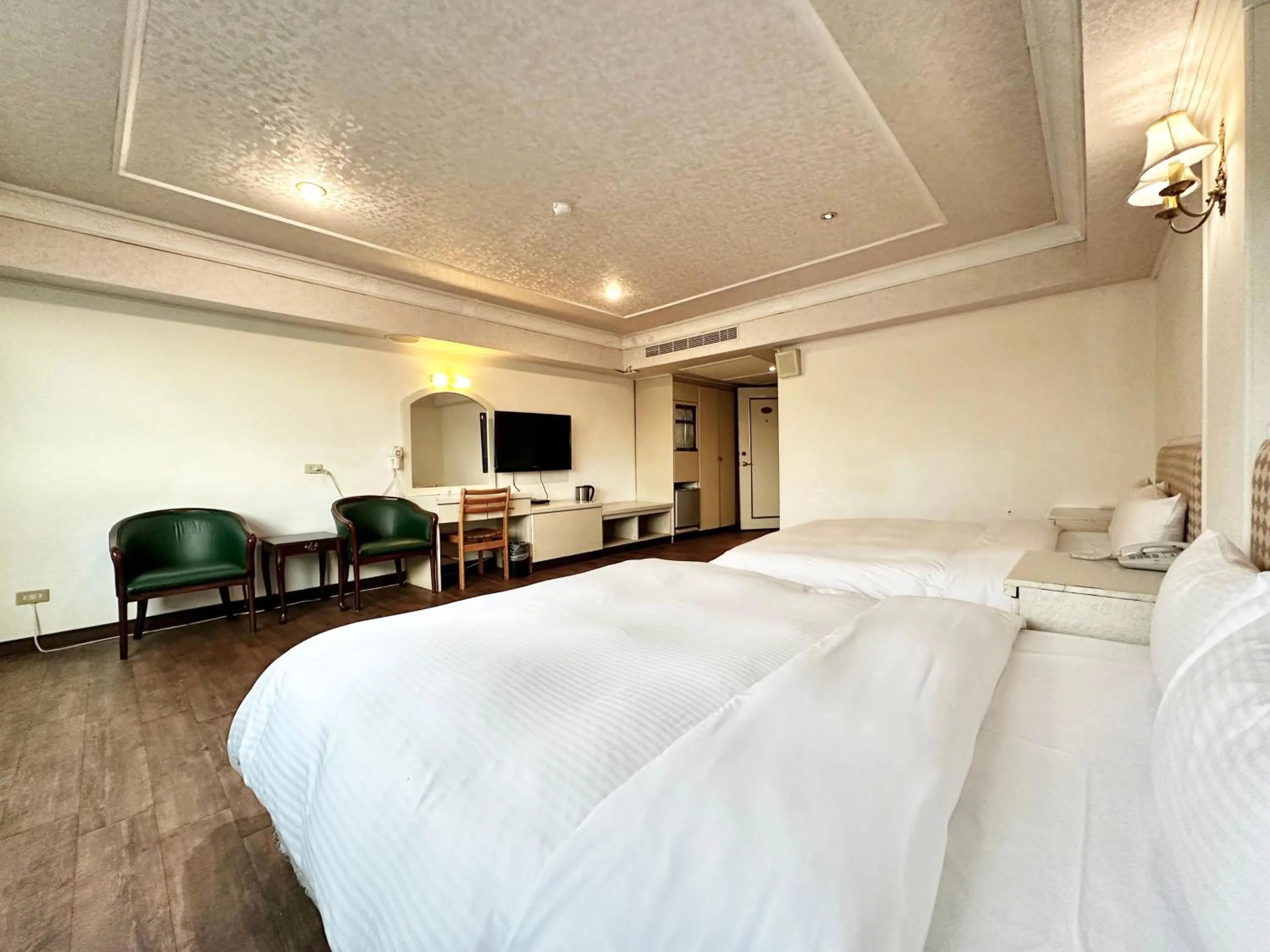 Bedroom in 東陽峇里商旅酒店