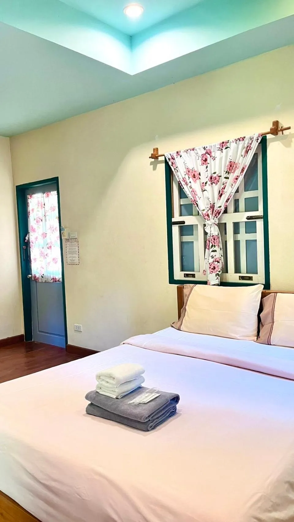 Bed in Pai Flora Resort