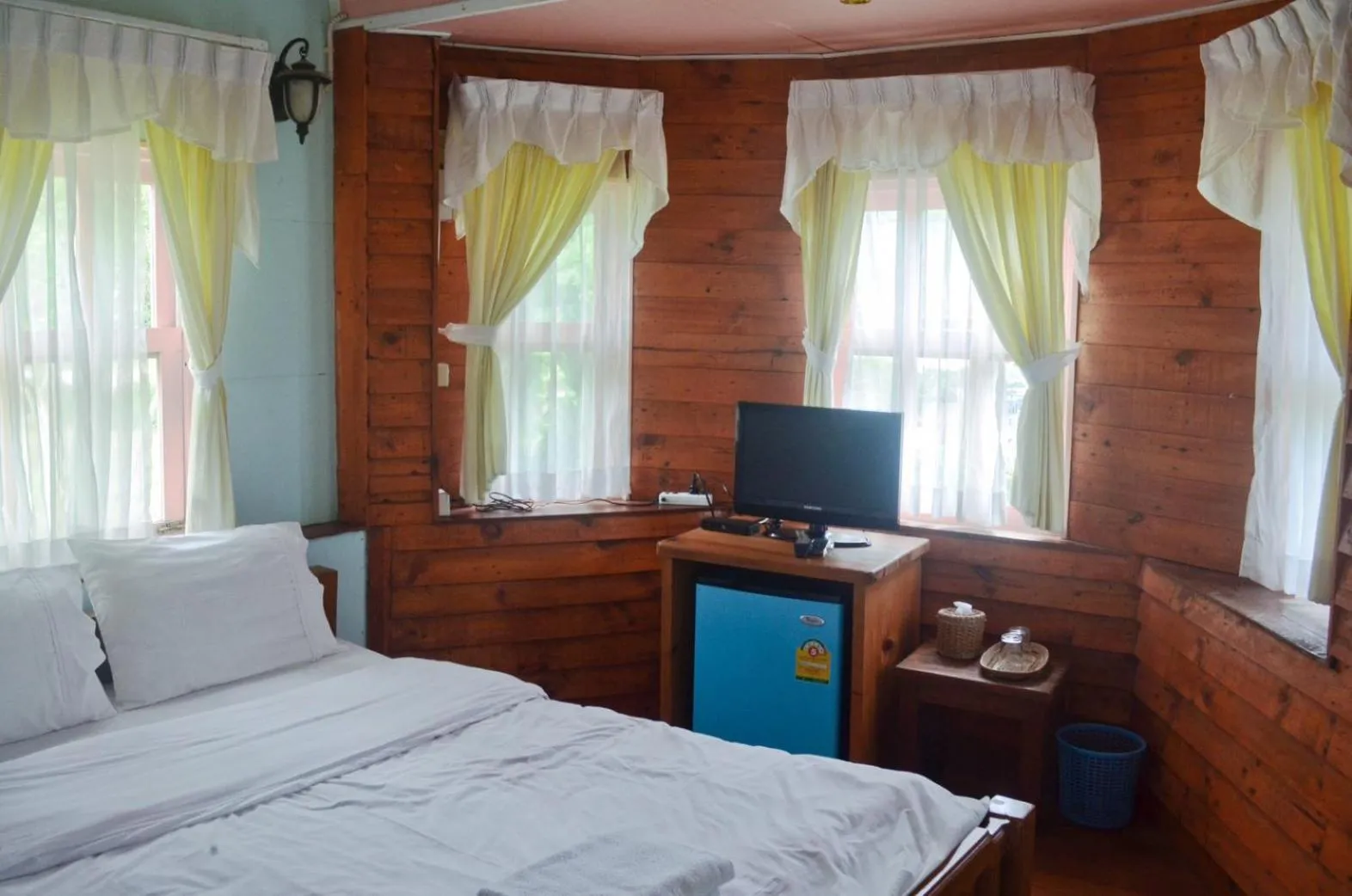 Bed in Pai Flora Resort