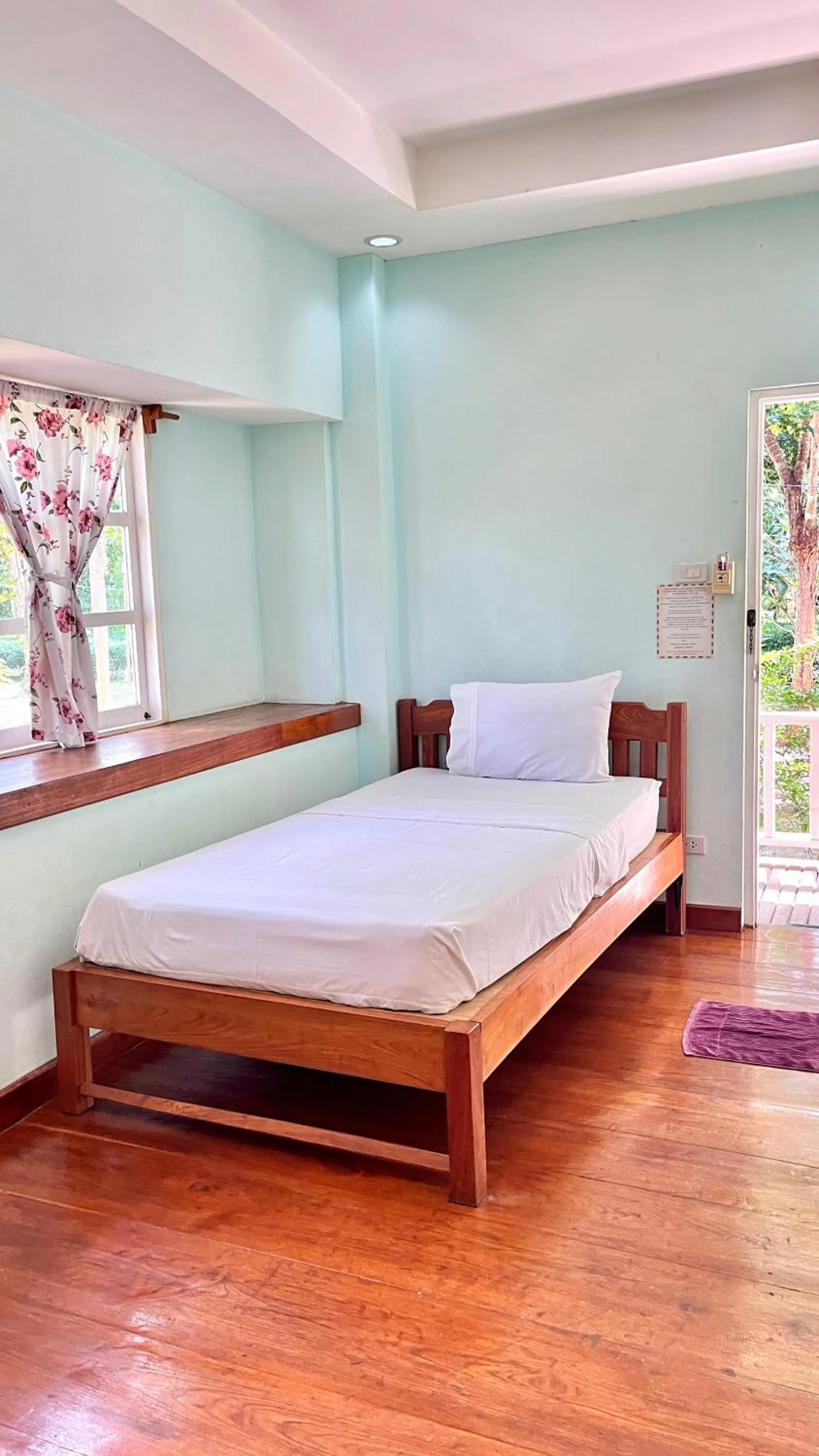 Bed in Pai Flora Resort