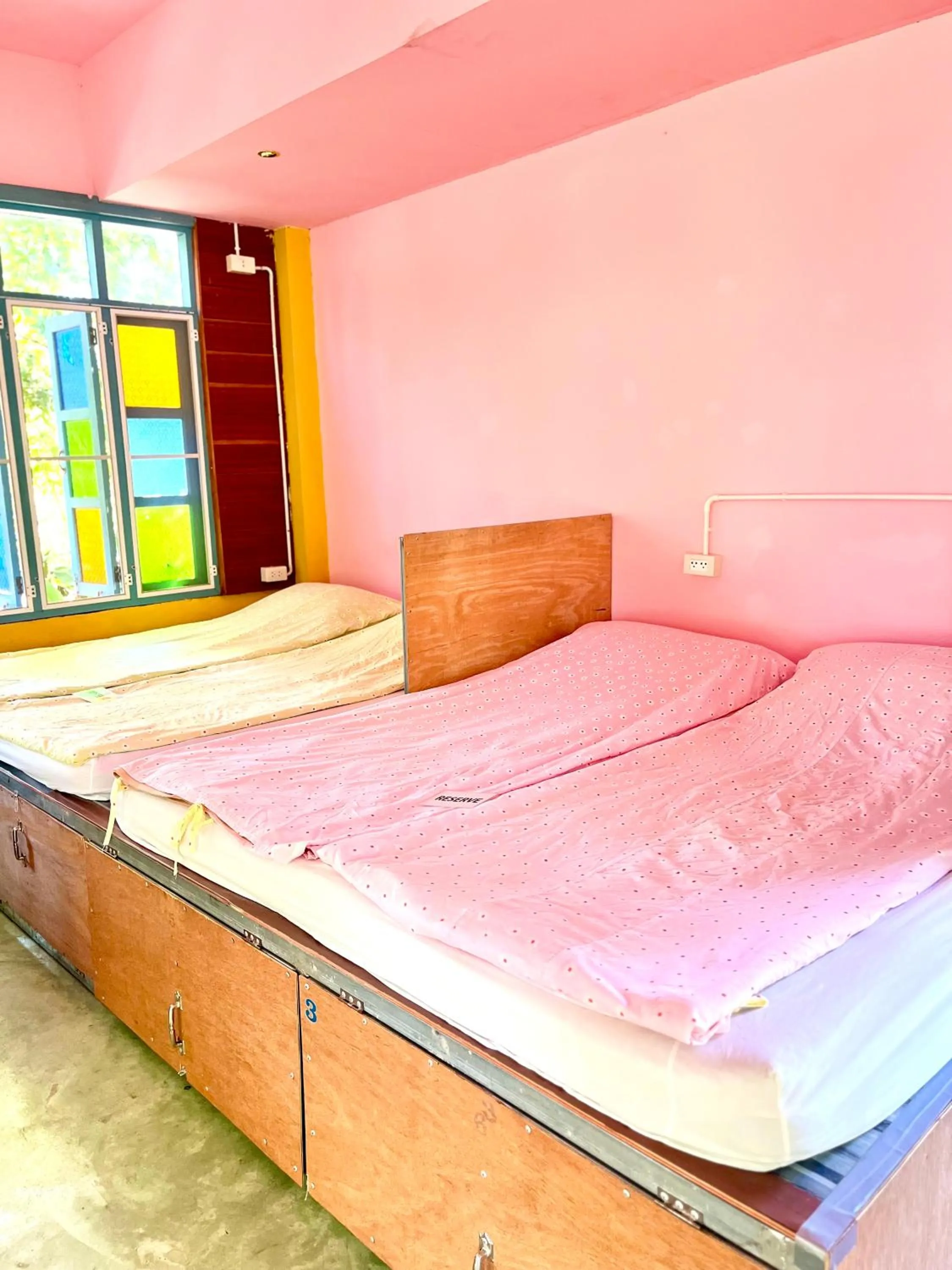 Bed in Pai Flora Resort