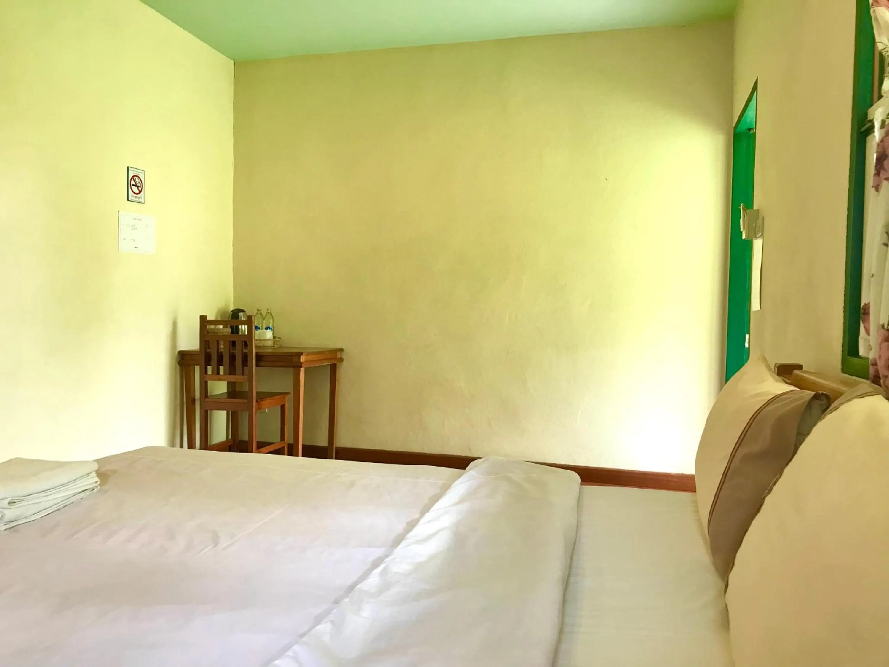 Photo of the whole room, Bed in Pai Flora Resort