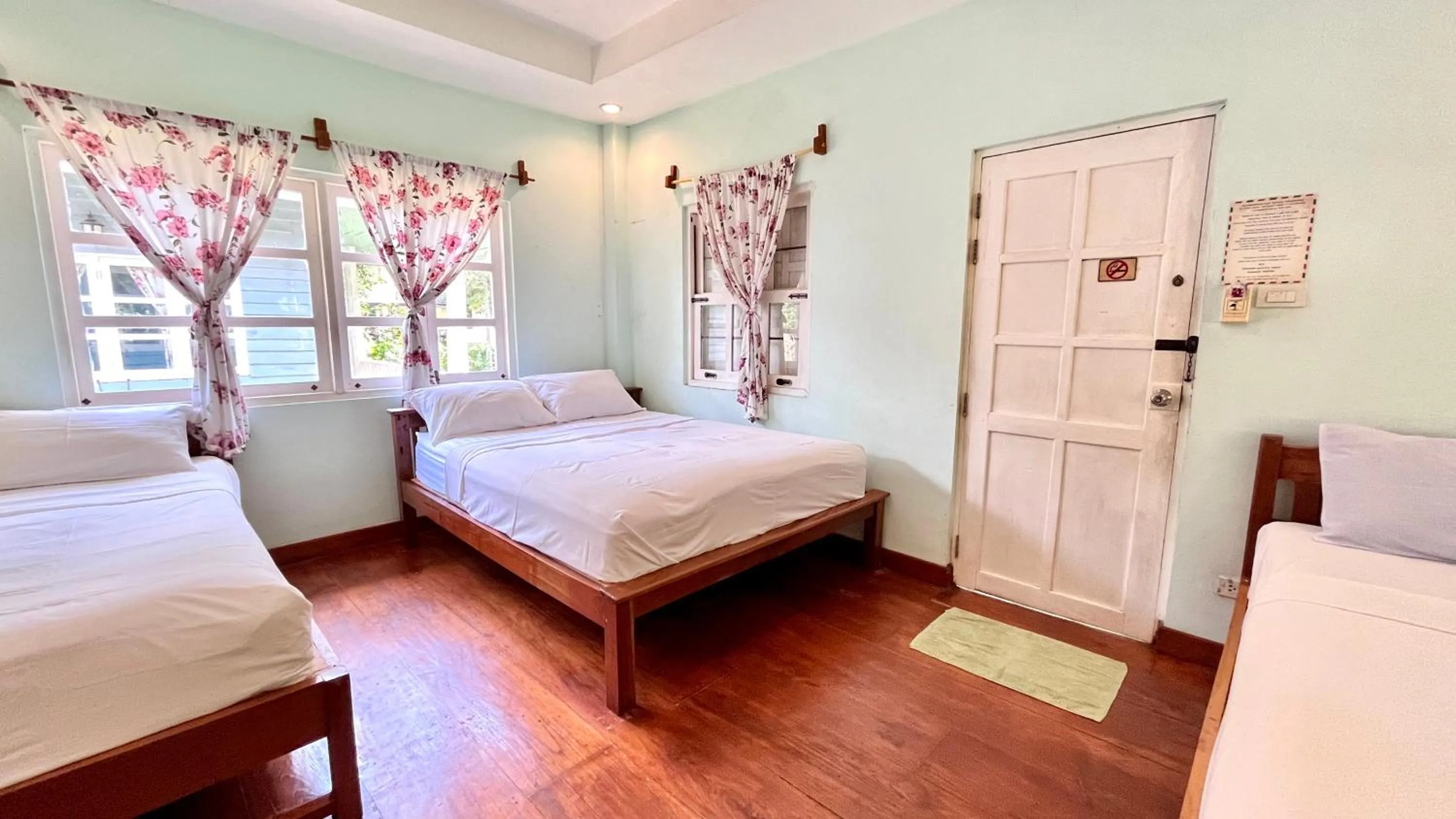 Bed in Pai Flora Resort