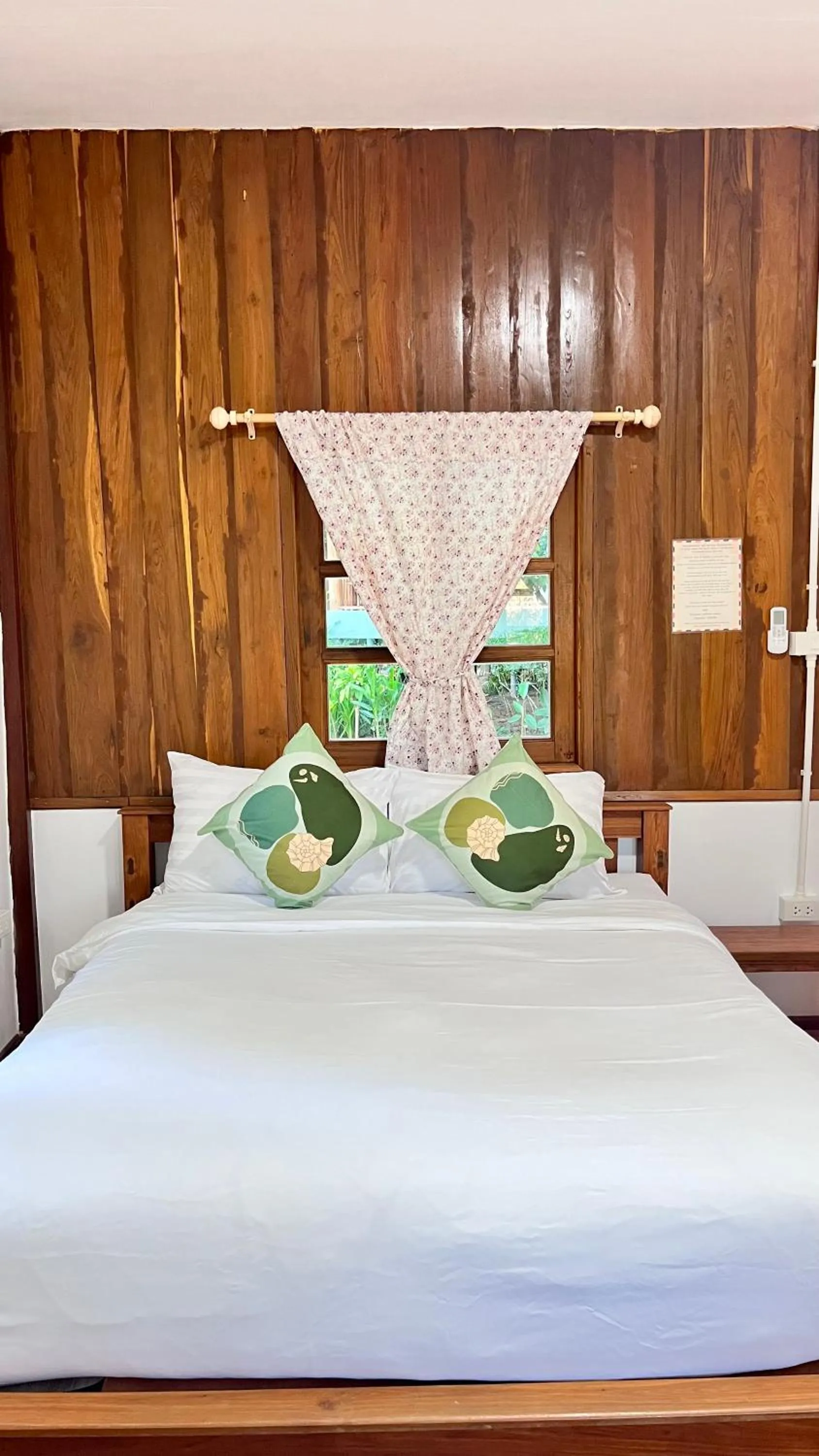 Bed in Pai Flora Resort