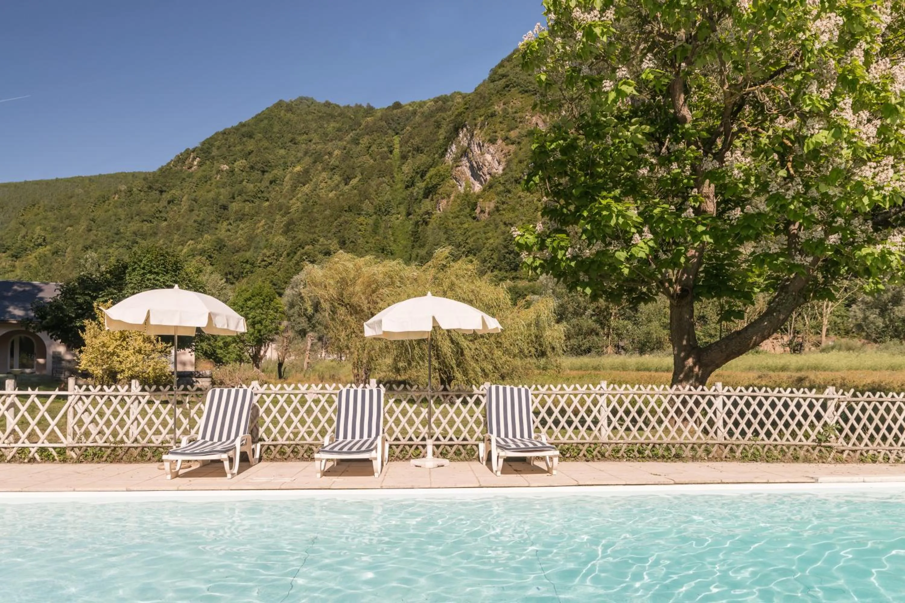 Swimming pool in Hôtel du Val d'Aure