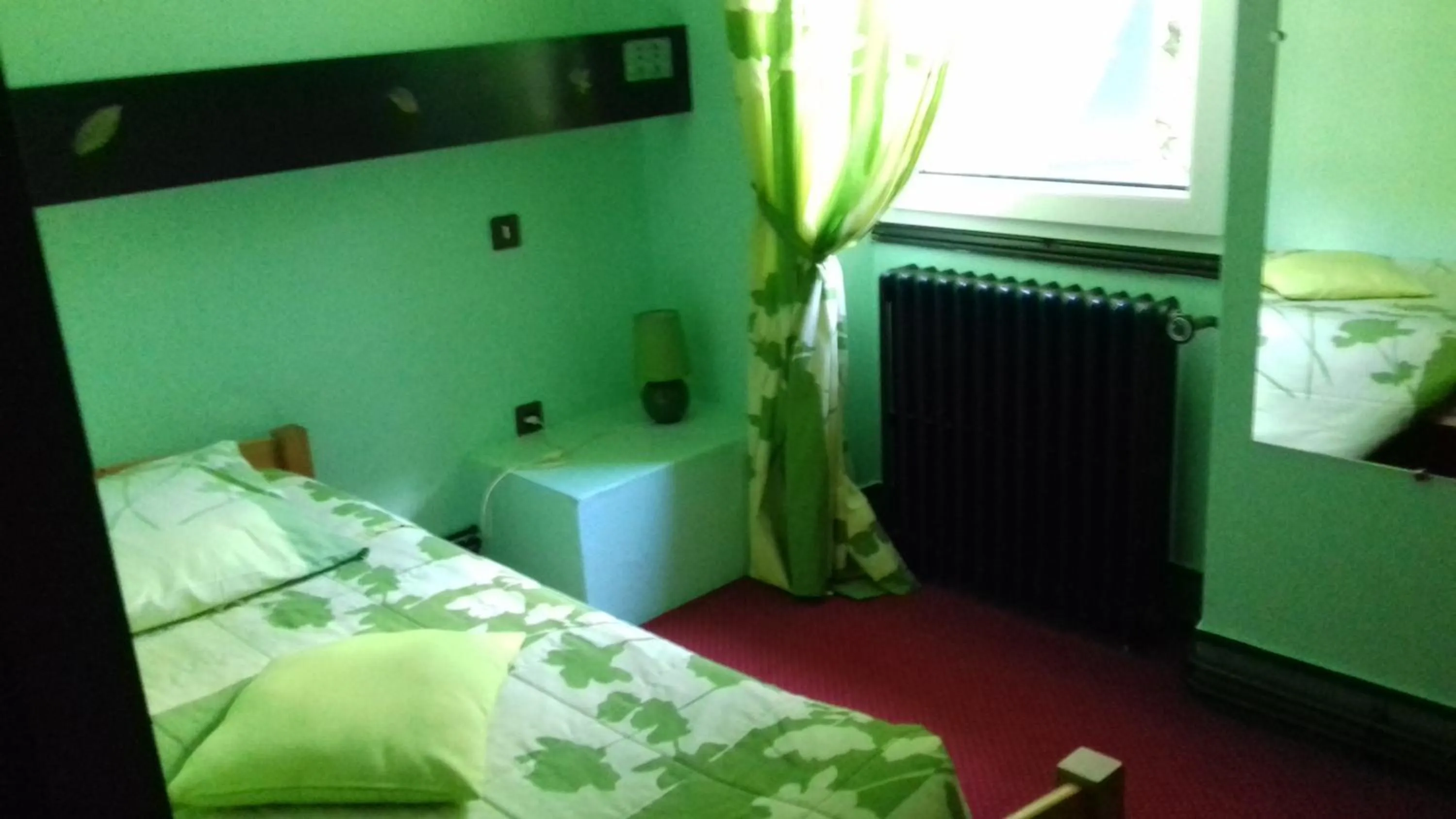 Bed in Hôtel du Val d'Aure