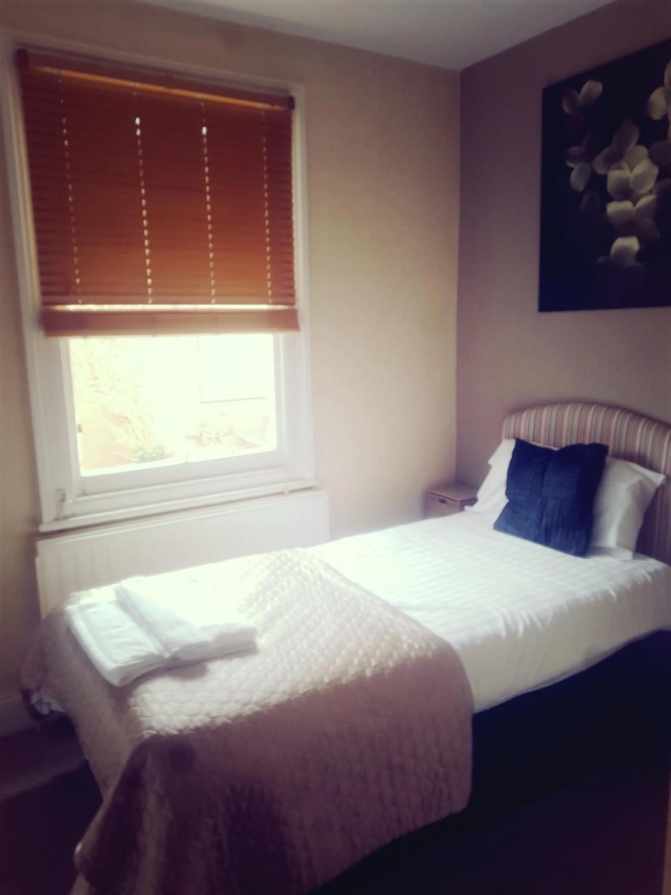 Bed in The Wimbledon Hotel