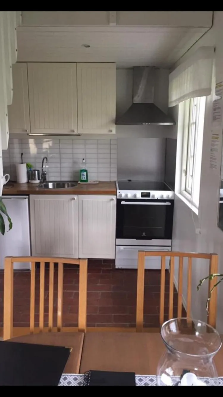 Kitchen or kitchenette in Kuskahusen vandrarhem