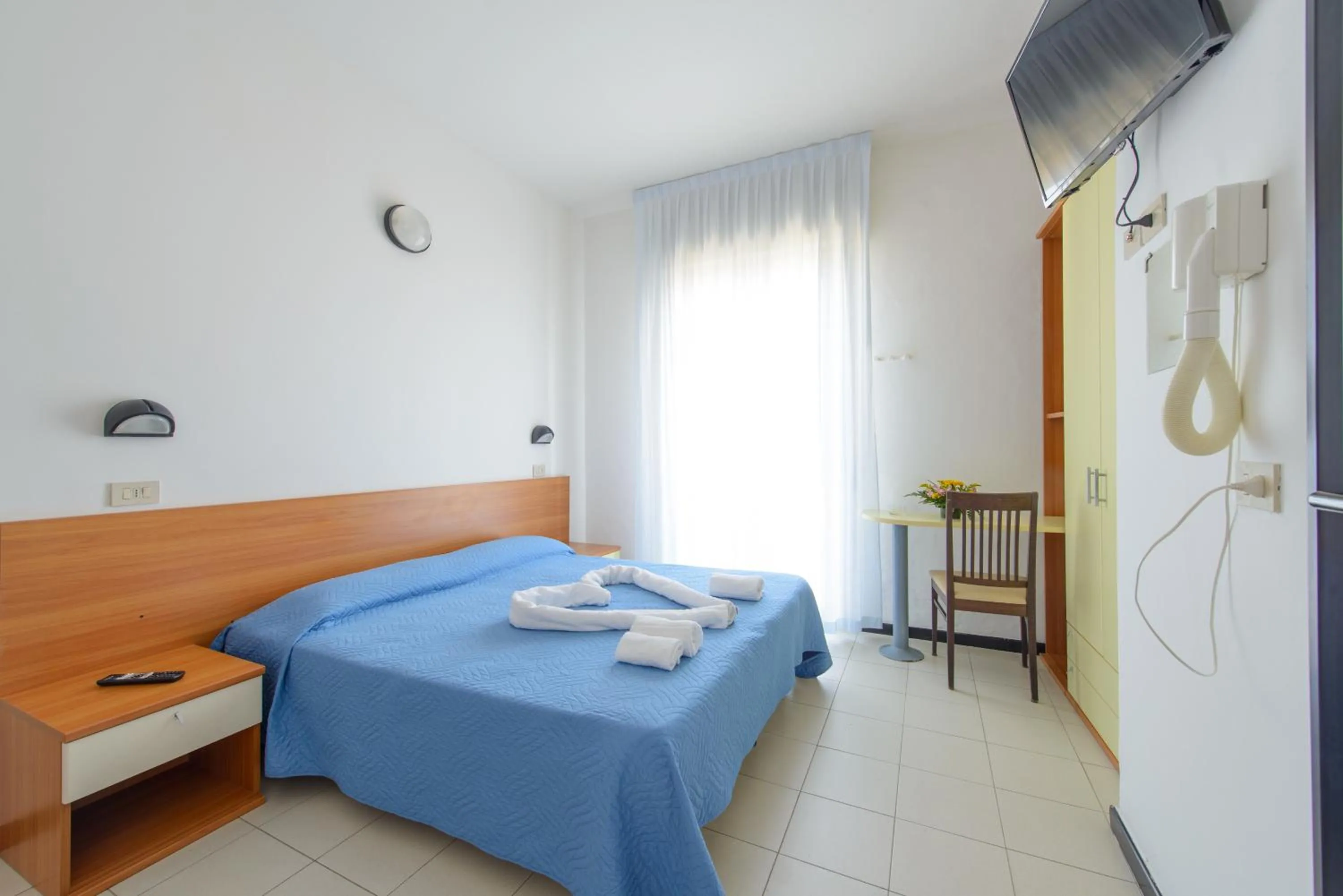 Bed in Hotel Paloma Beach Front Chiringuitos Time