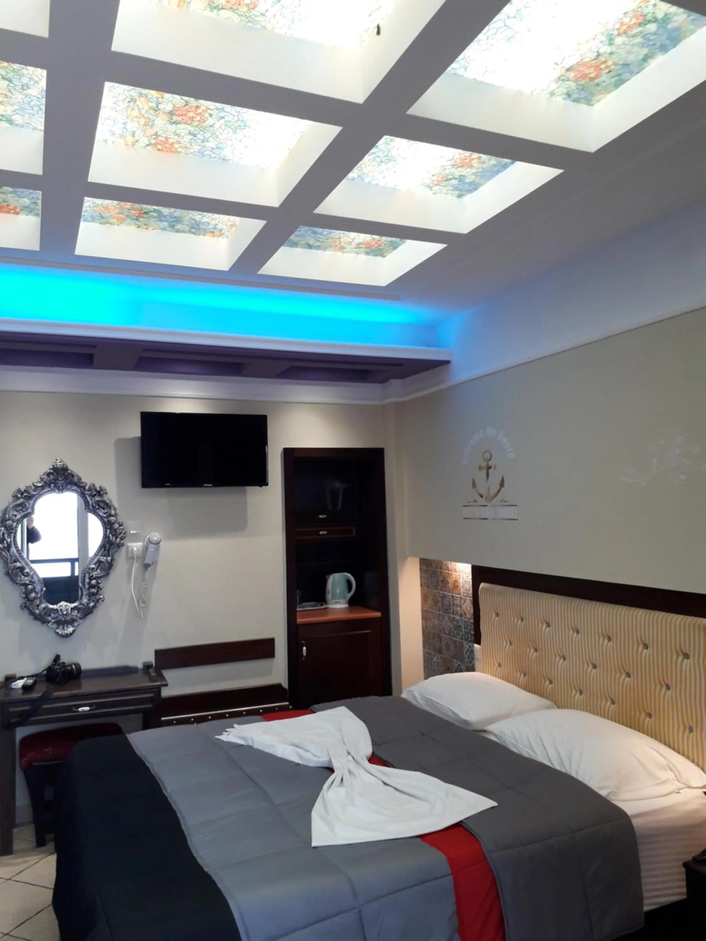 Toilet, Bed in Blue Sea Beach Hotel