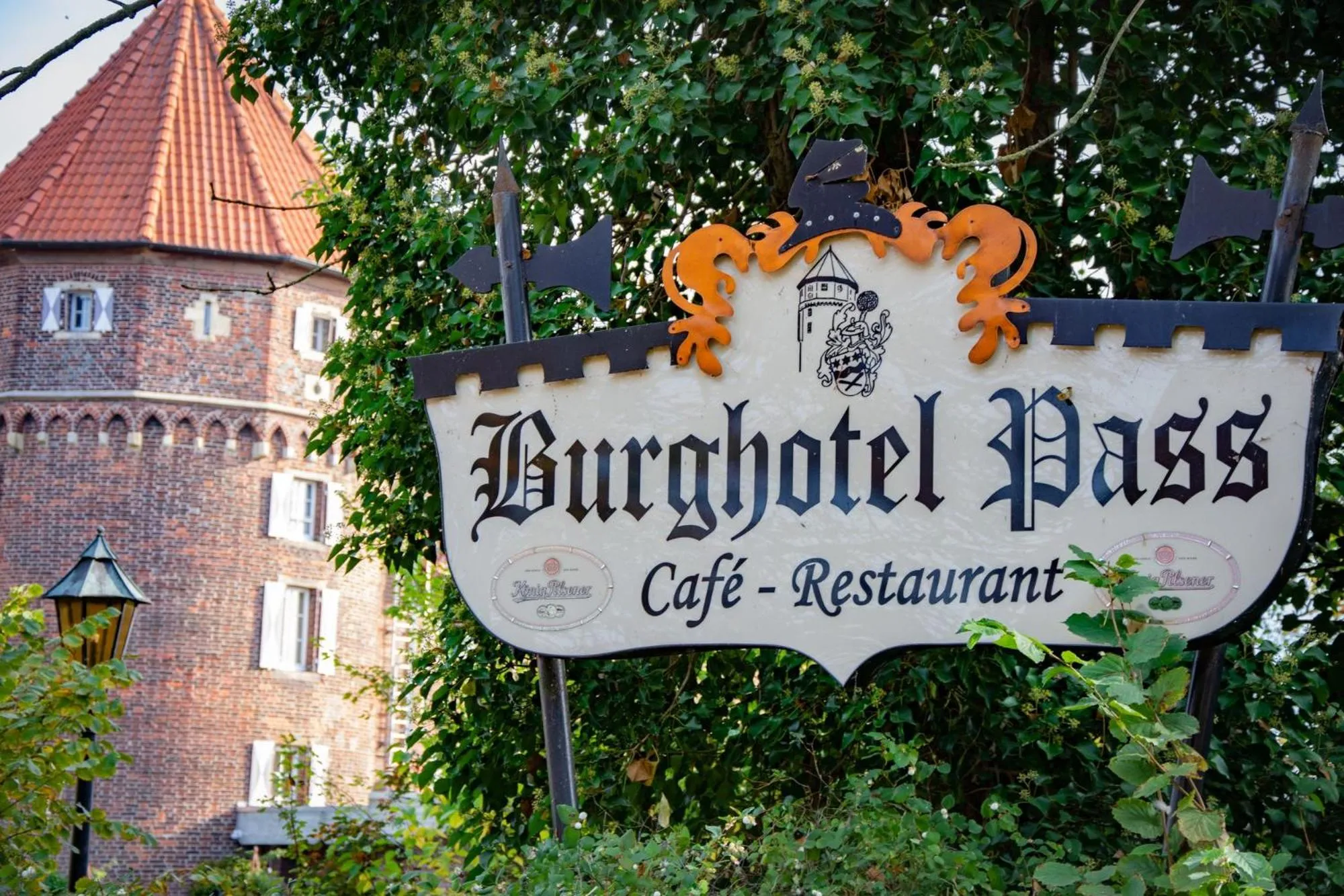 Property logo or sign in Burghotel Pass