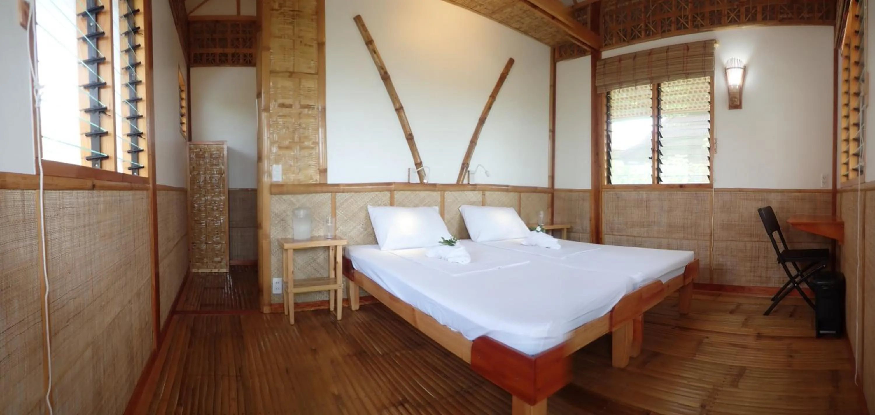 Bed in Eskapo Verde Lodge Moalboal