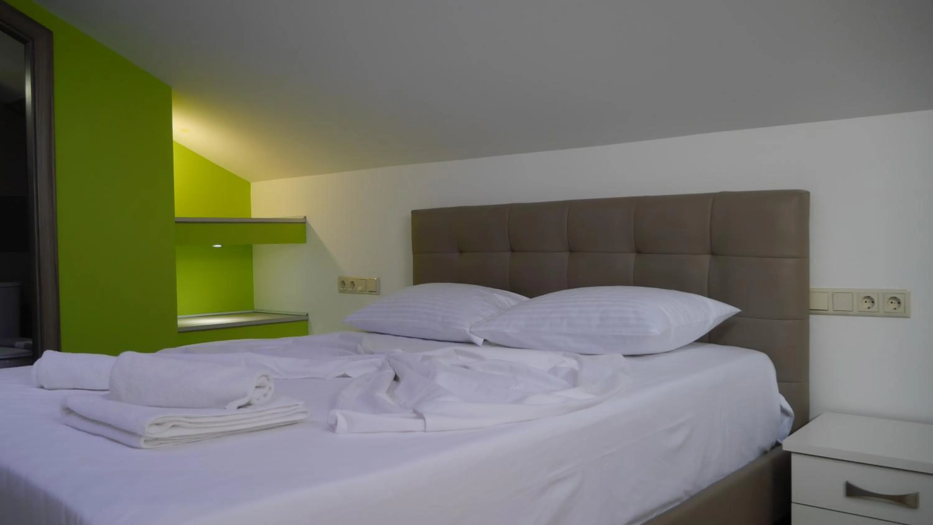 Photo of the whole room, Bed in Blue Sky Apartments