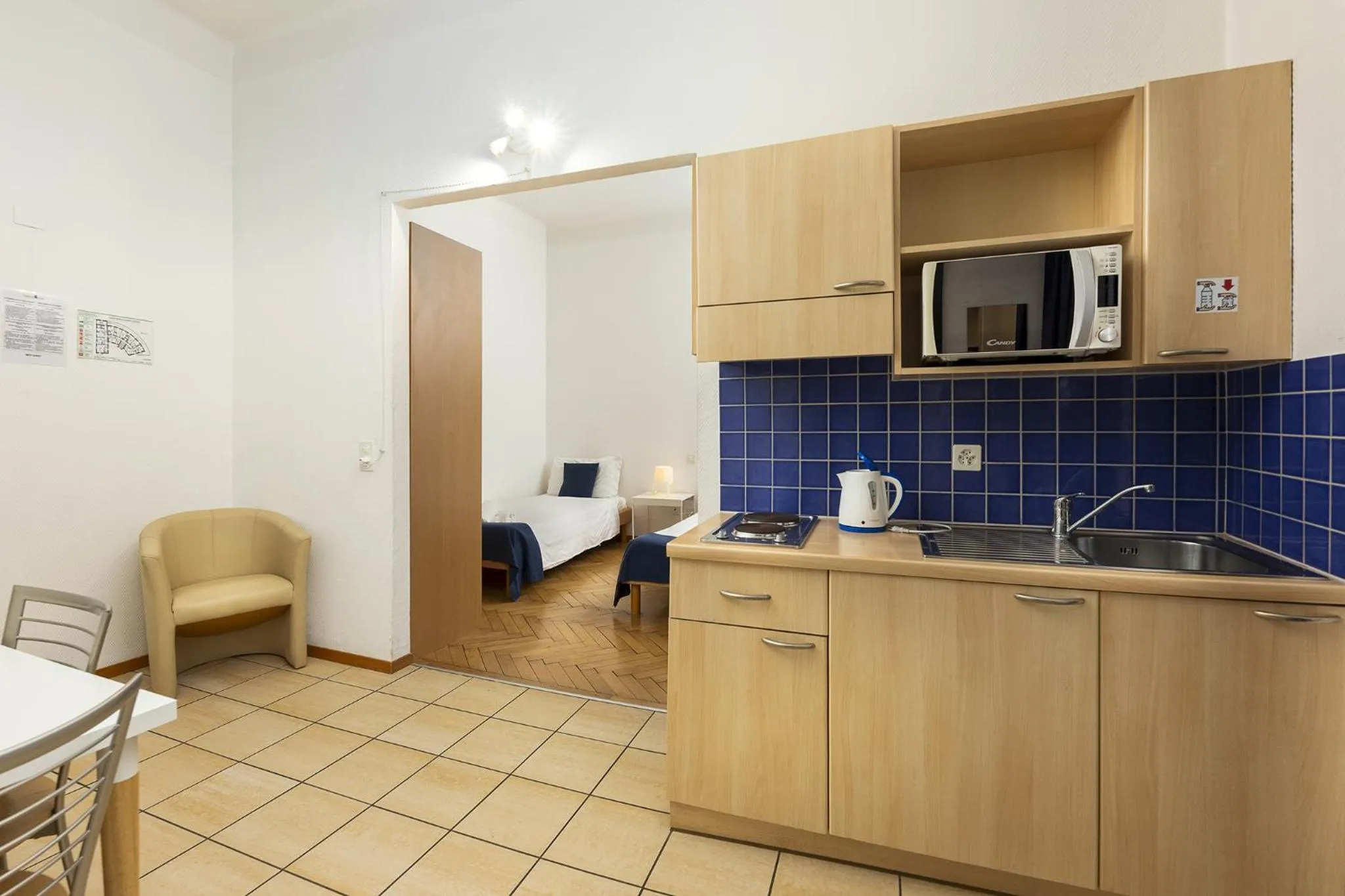 Coffee/tea facilities in GuestHouse Lugano Center by LR