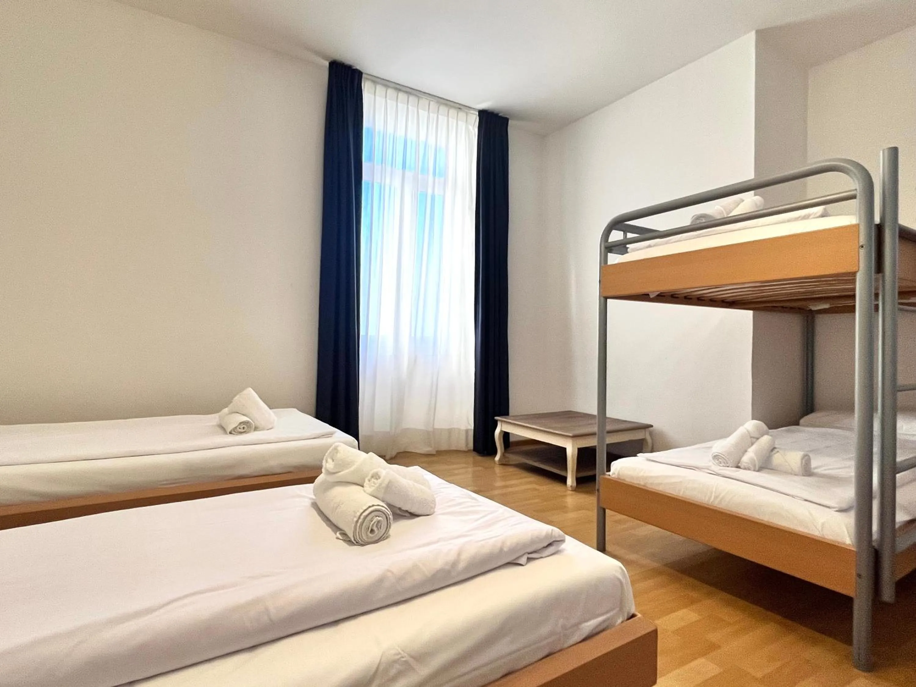 Bed in GuestHouse Lugano Center by LR