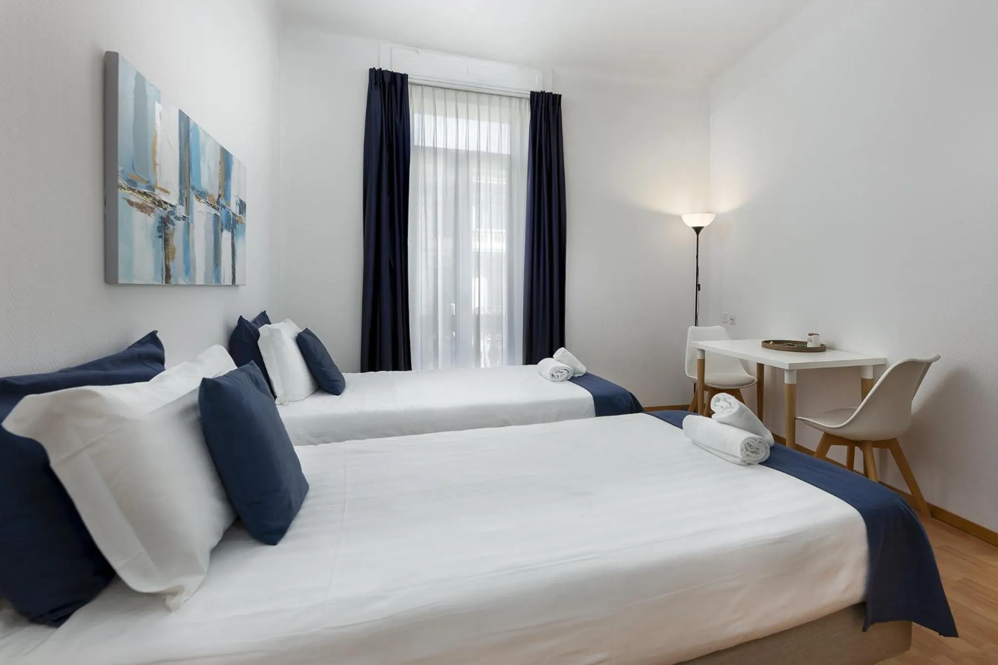 Bed in GuestHouse Lugano Center by LR