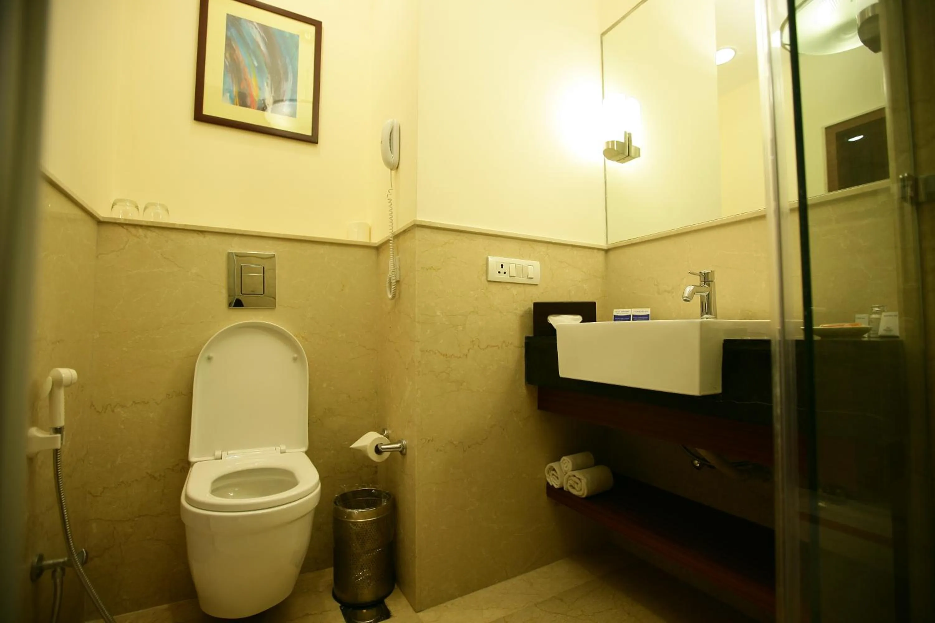 Bathroom in Muse Sarovar Portico Nehru Place