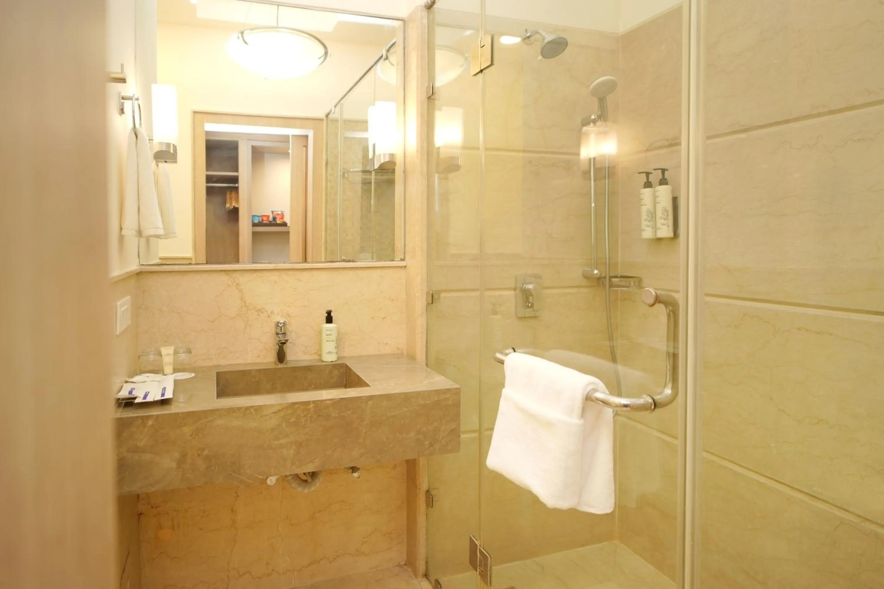 Bathroom in Muse Sarovar Portico Nehru Place