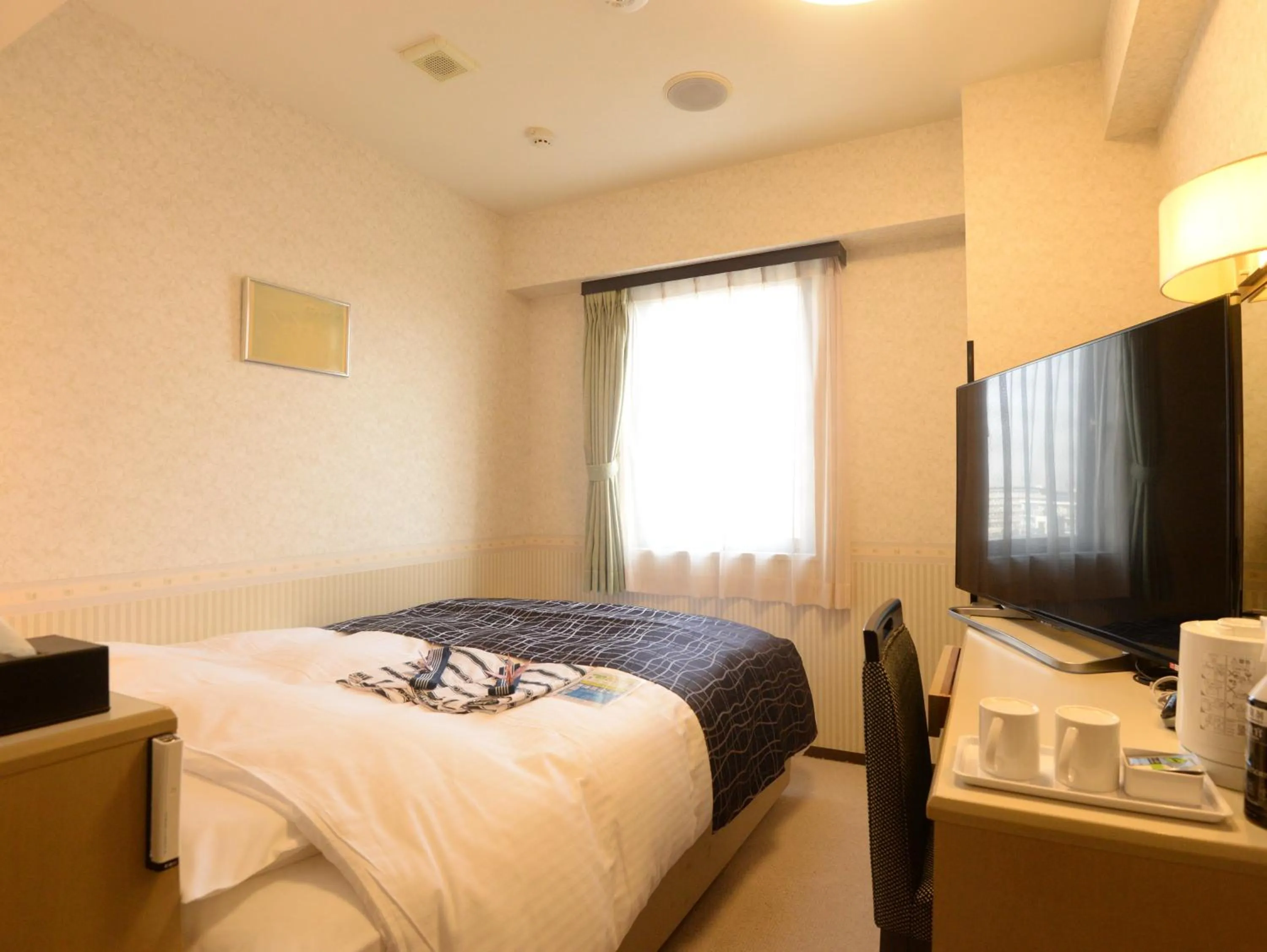 Photo of the whole room, Bed in APA Hotel Sagamihara Kobuchi Ekimae