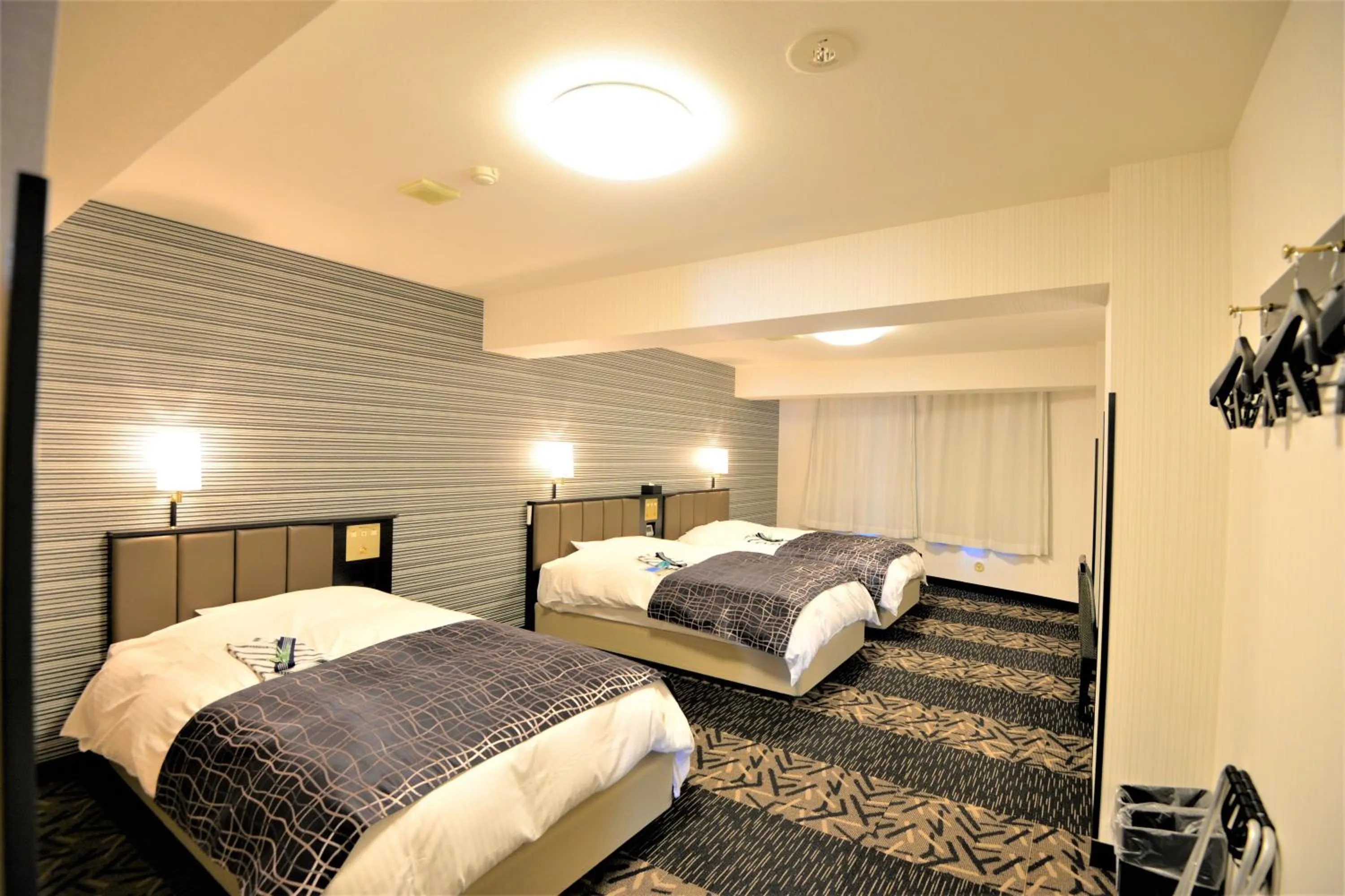 Photo of the whole room, Bed in APA Hotel Sagamihara Kobuchi Ekimae
