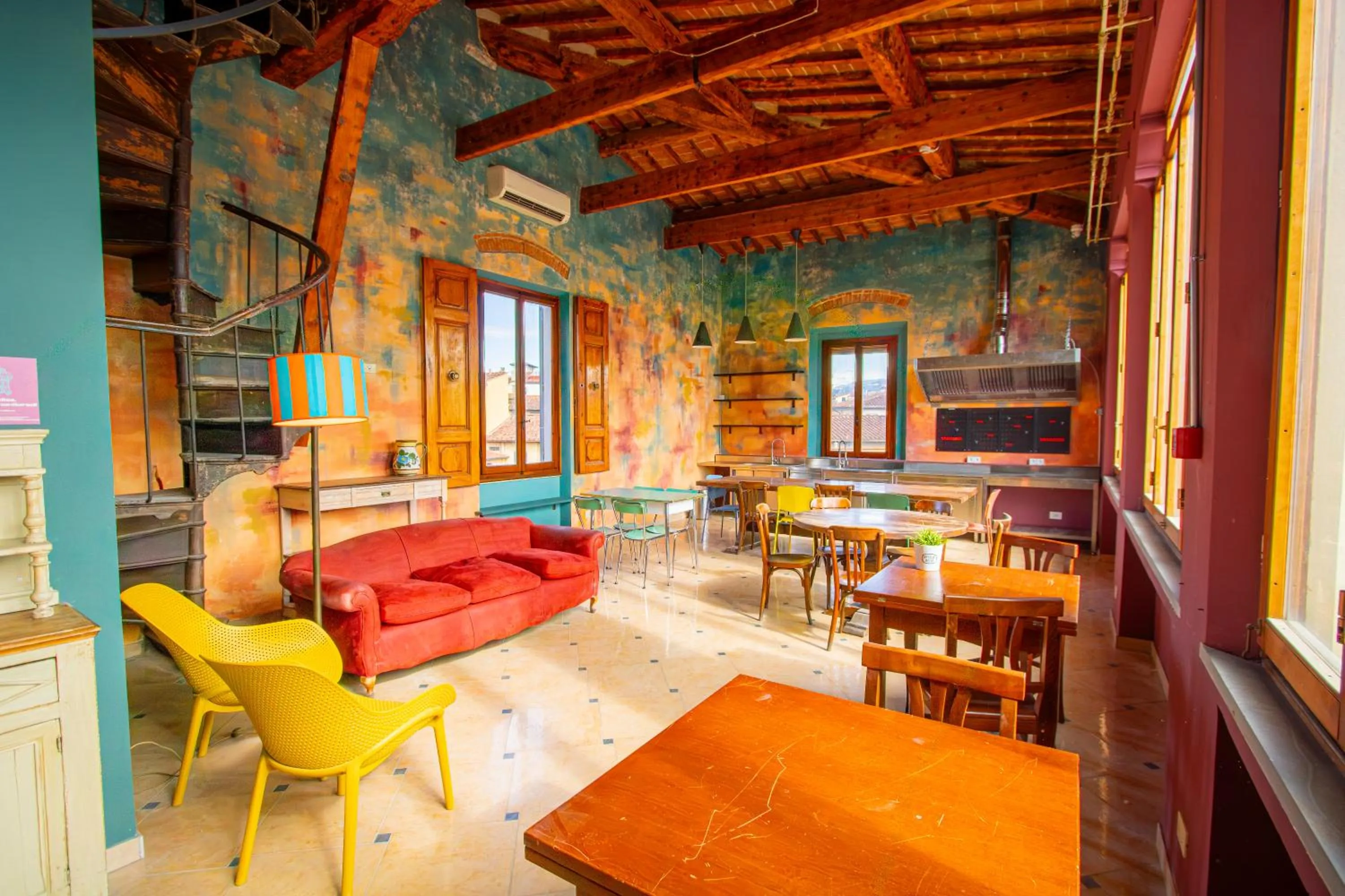 Communal lounge/ TV room in Hotel Merlini